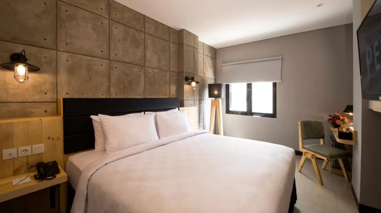 Bed in Ayaartta Hotel Malioboro