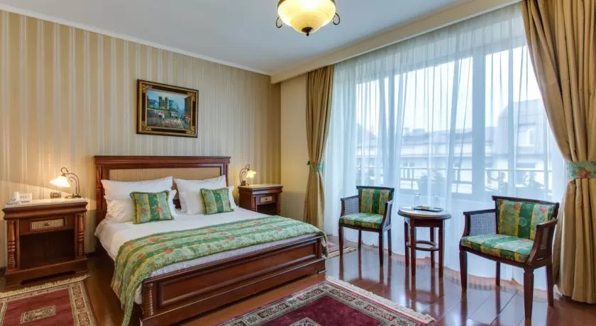 Bed in Vila Paris Boutique Hotel