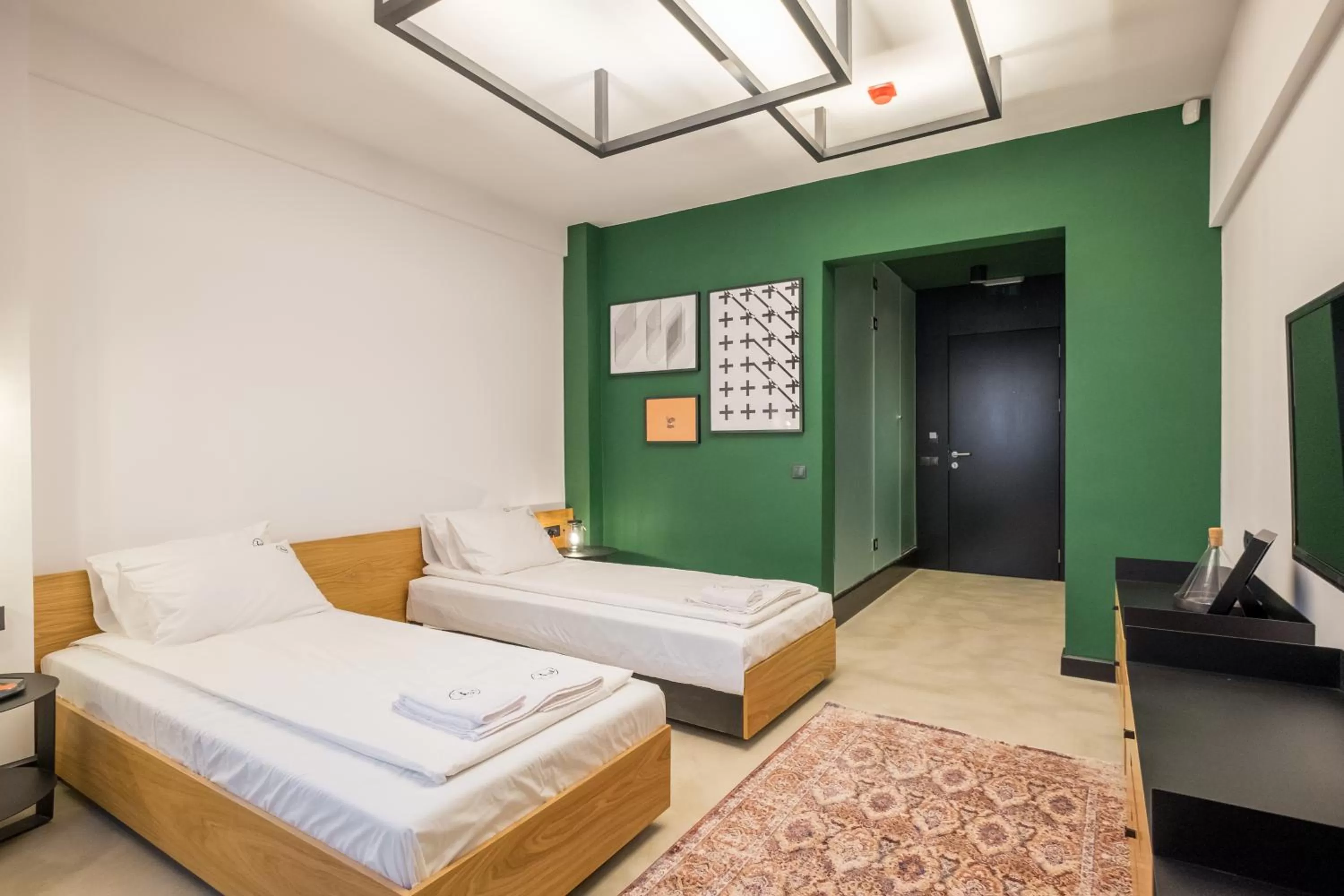 Bed in R34 Boutique Hotel