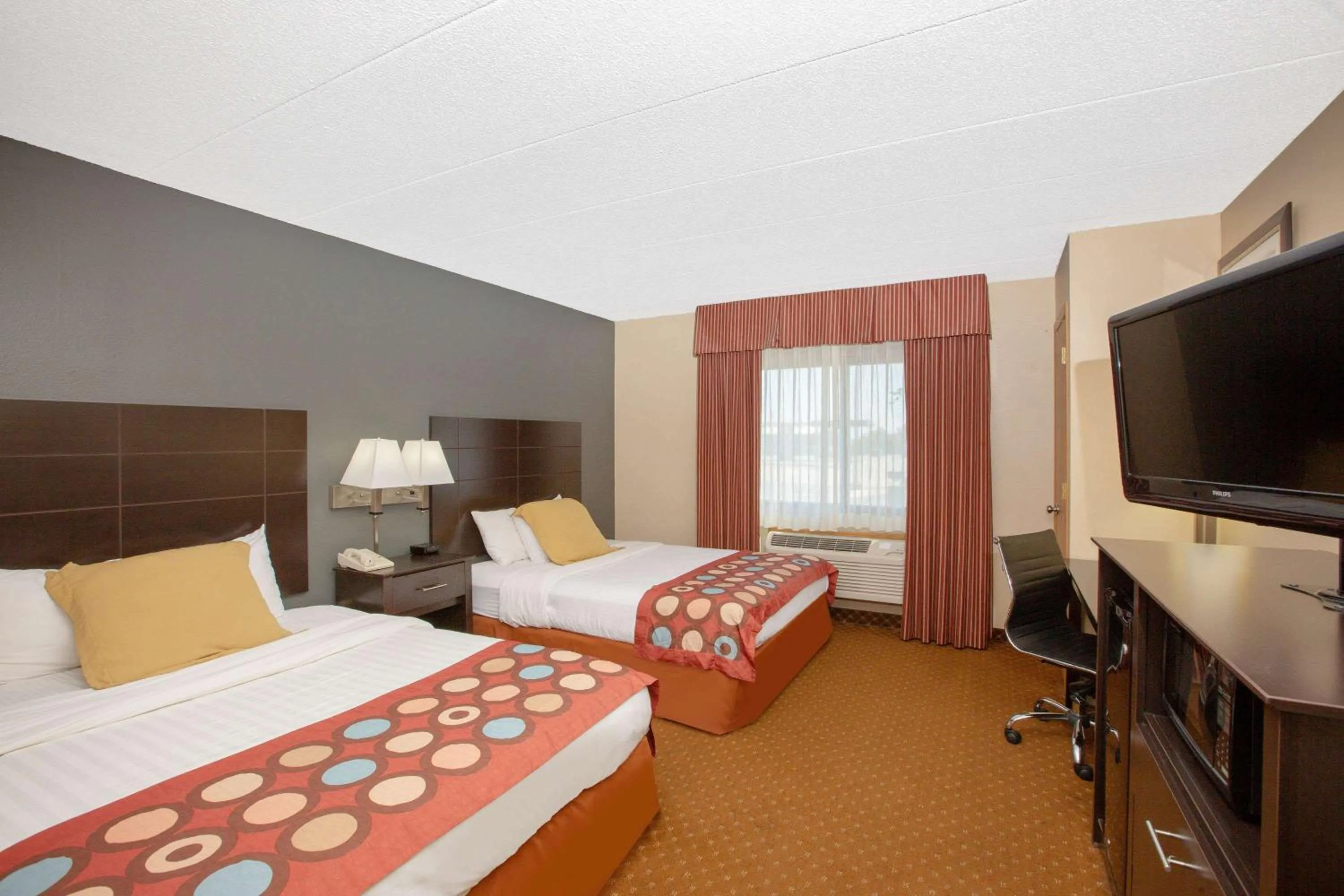 Photo of the whole room, Bed in AmericInn by Wyndham Coralville