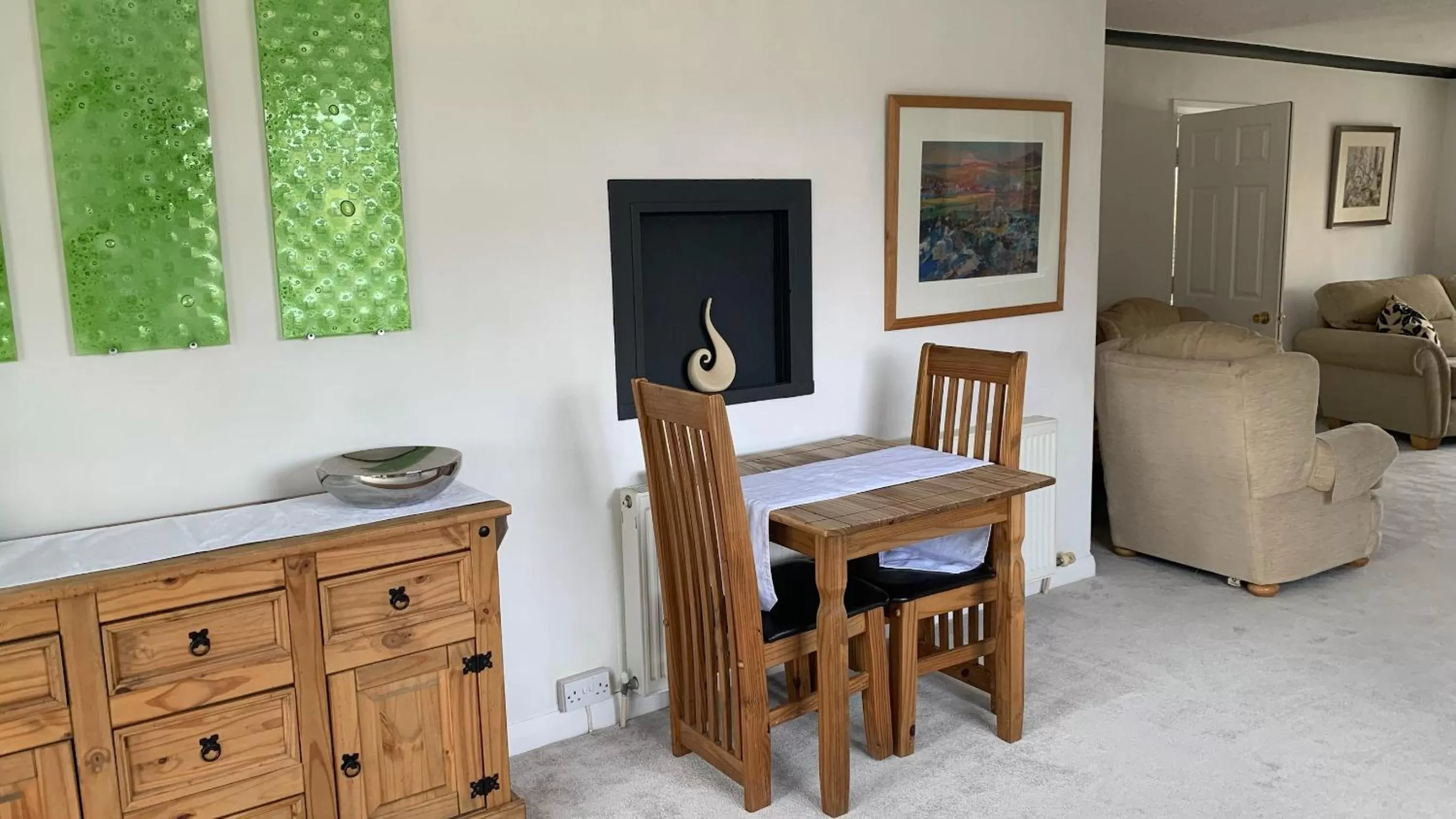 Dining area, TV/Entertainment Center in Ramsey House
