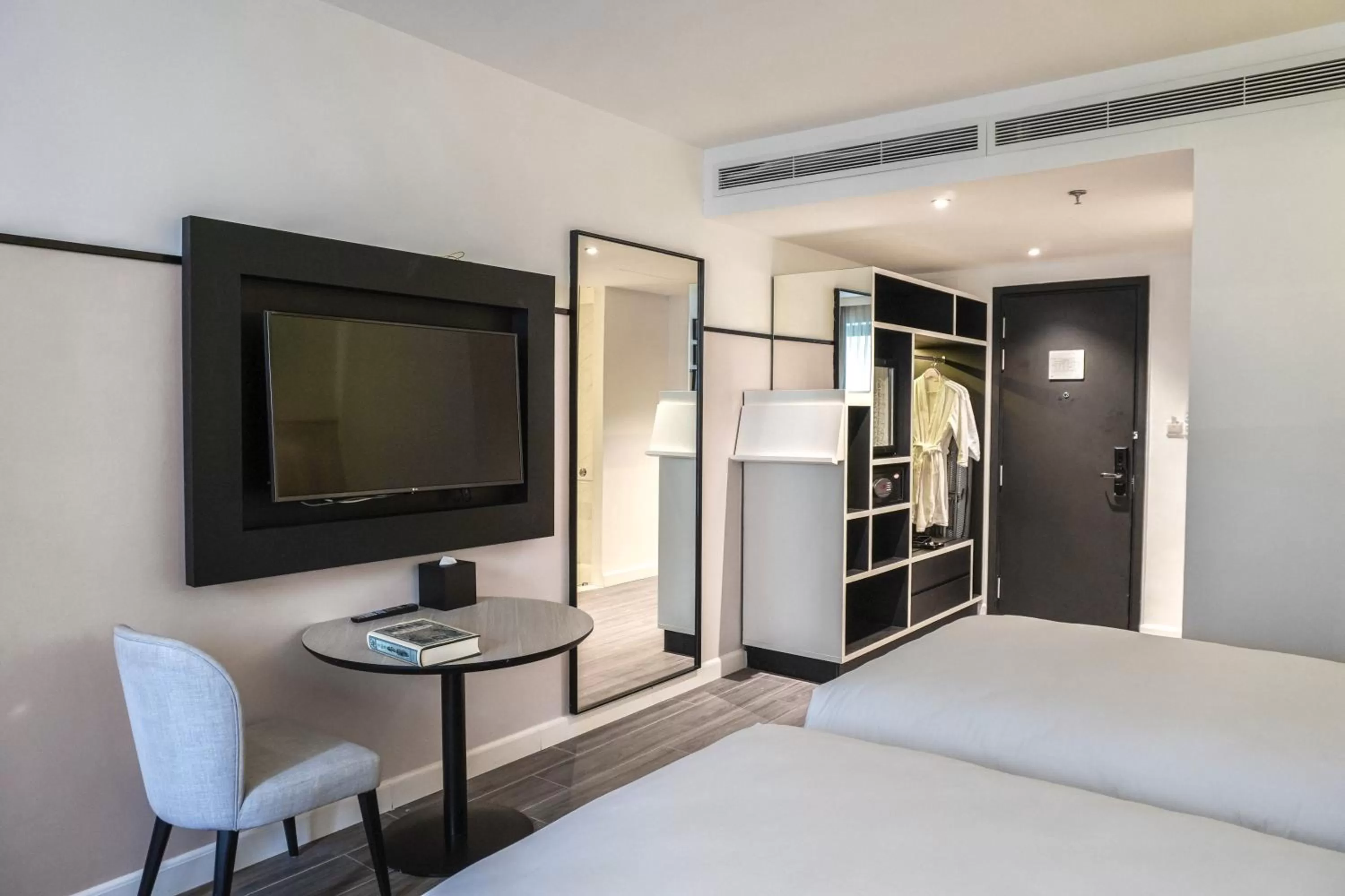 Photo of the whole room, Bed in M Village Hotel Tôn Thất Đạm