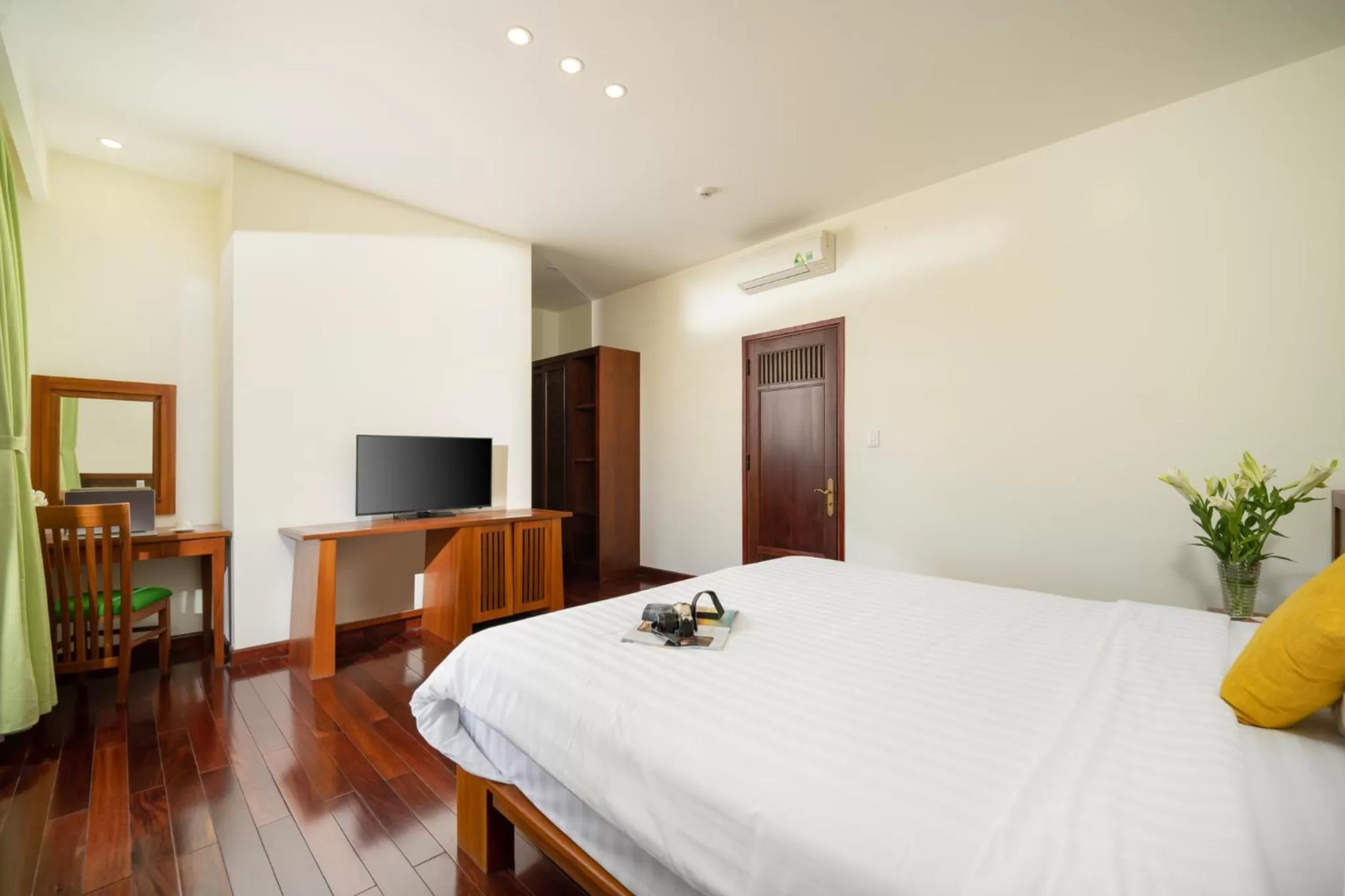 Bed, TV/Entertainment Center in Palm Village Hoian - STAY 24H