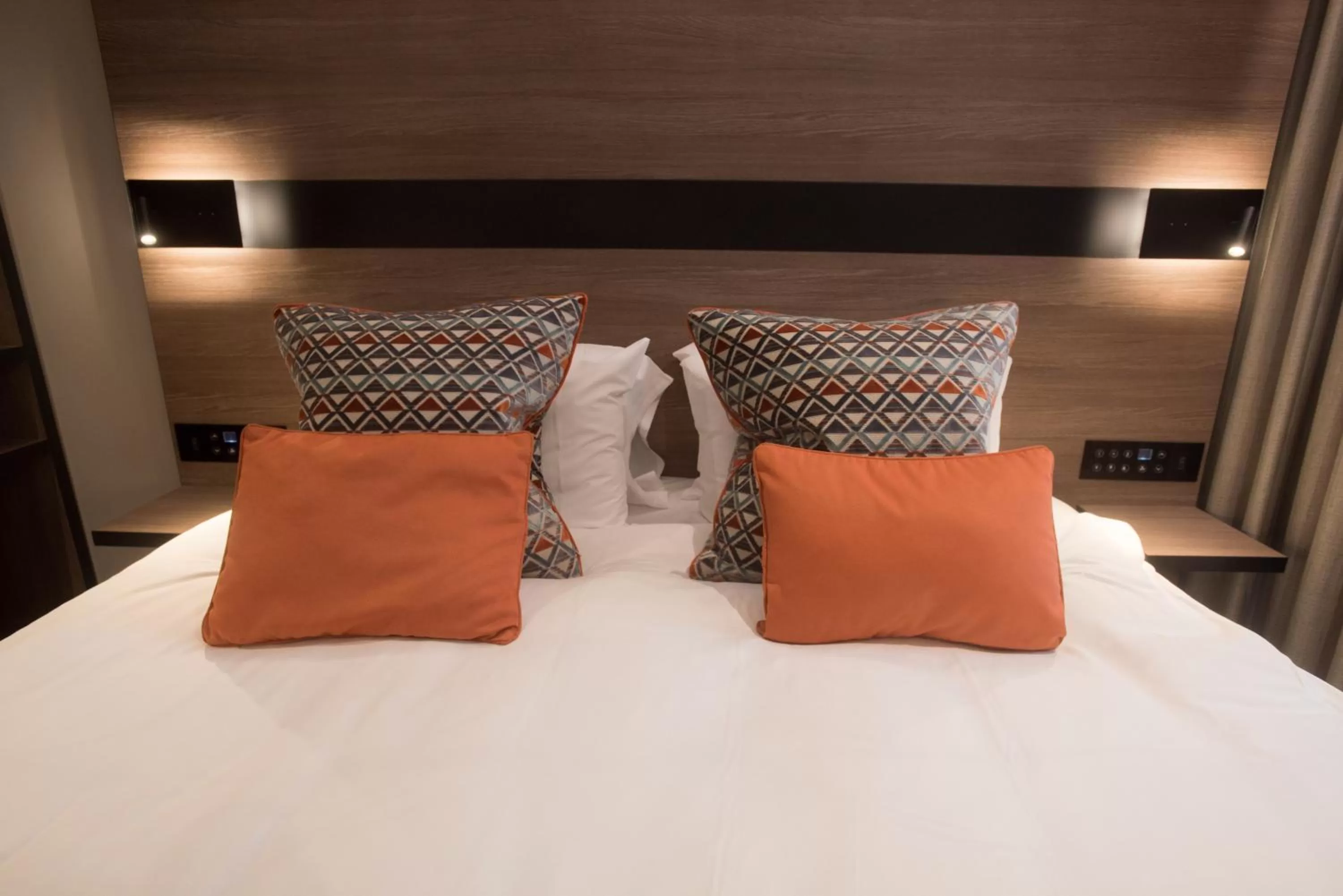 Bed in Merit Kensington Hotel