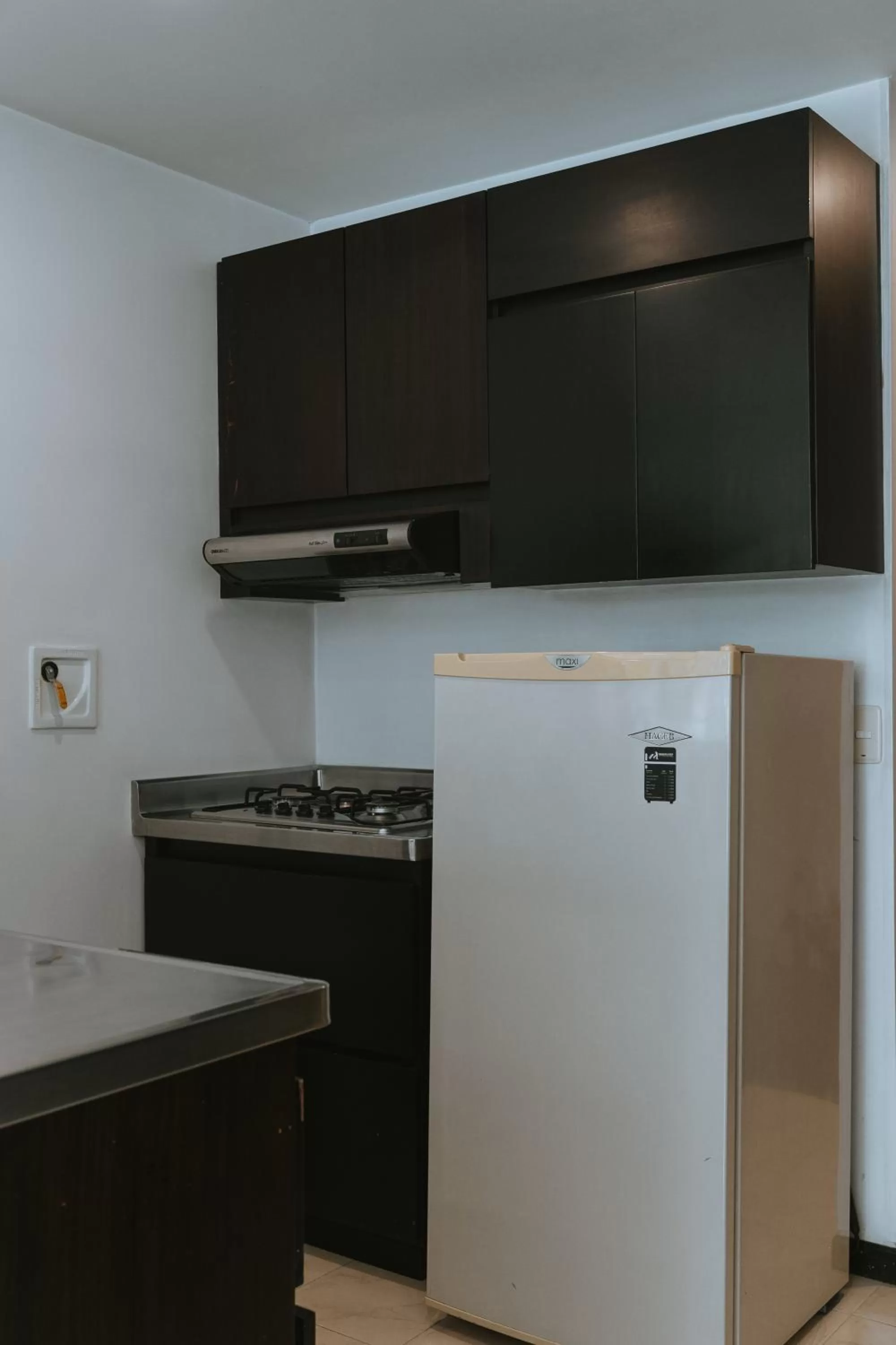 kitchen in Travelers Orange Suites