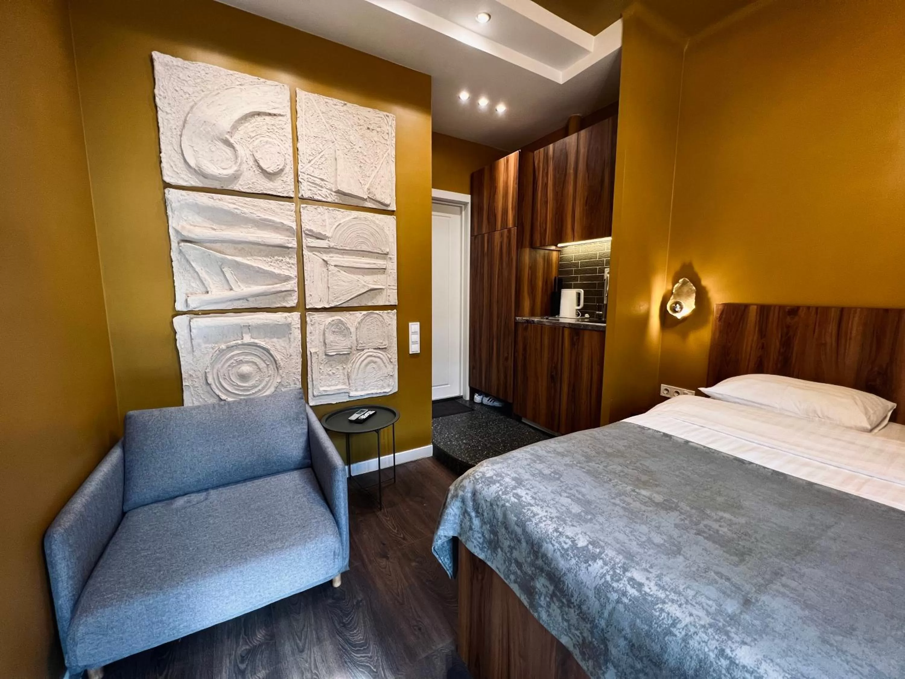 Seating area, Bed in Kyiv Panorama Apartments near Gulliver