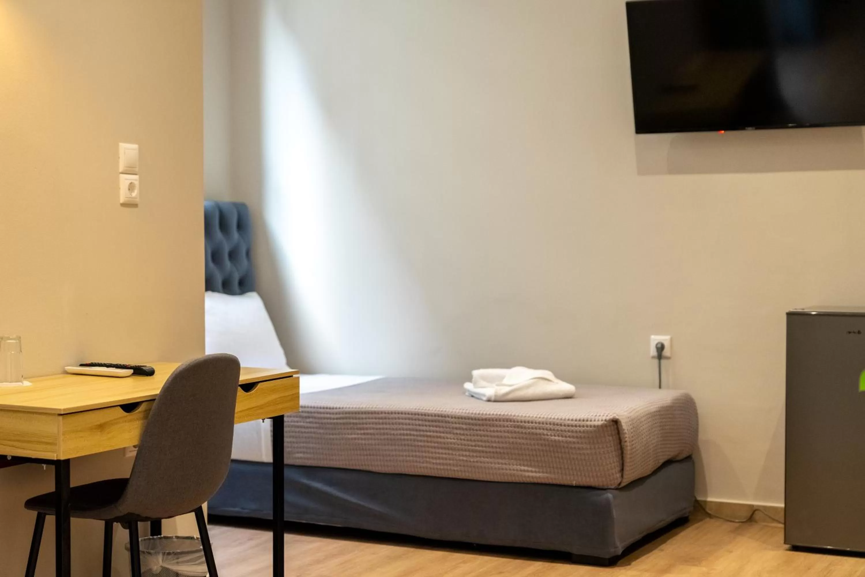 Bed in New Amaryllis Hotel