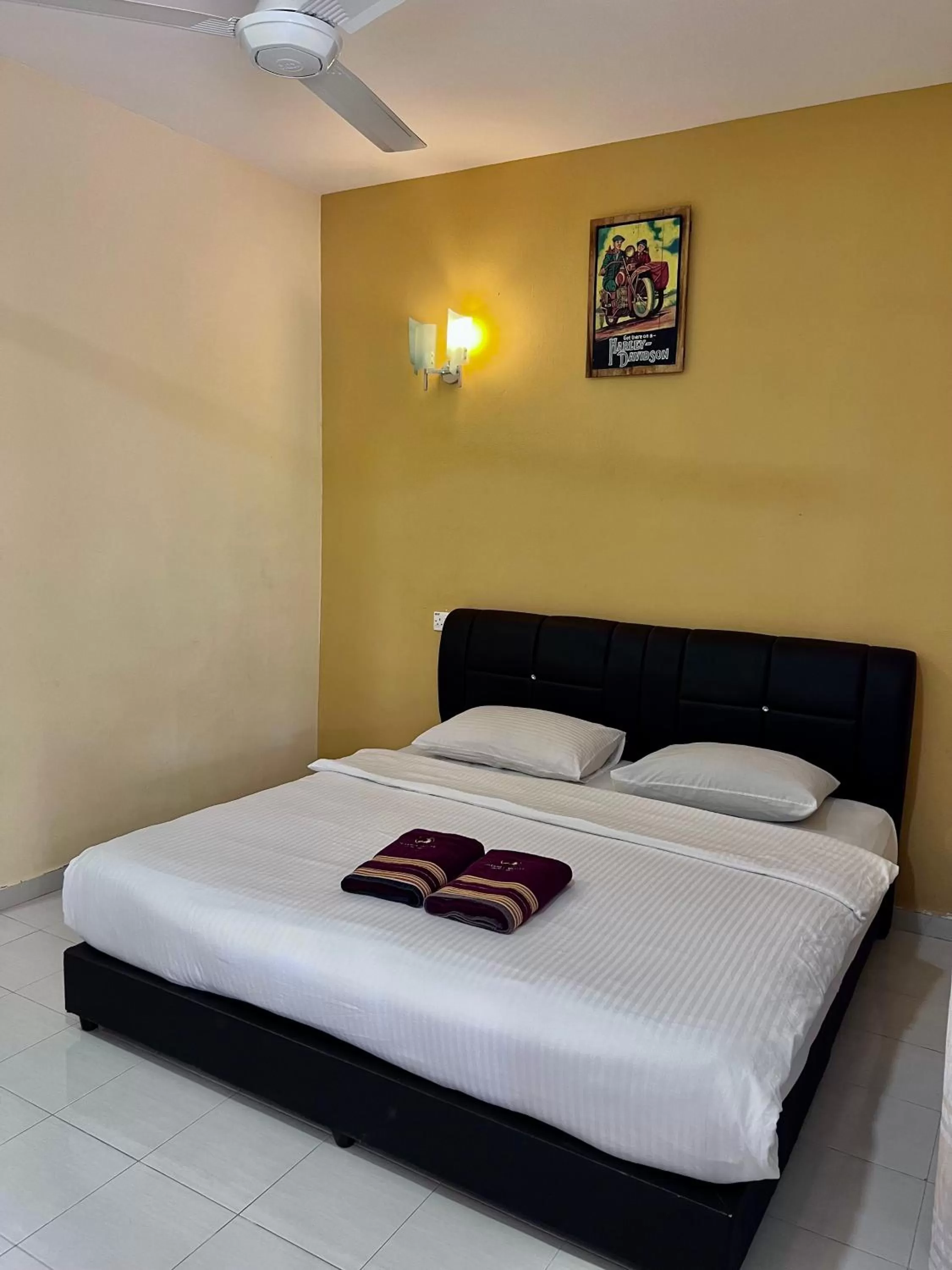 Bed in Dhania Cenang Beach Motel