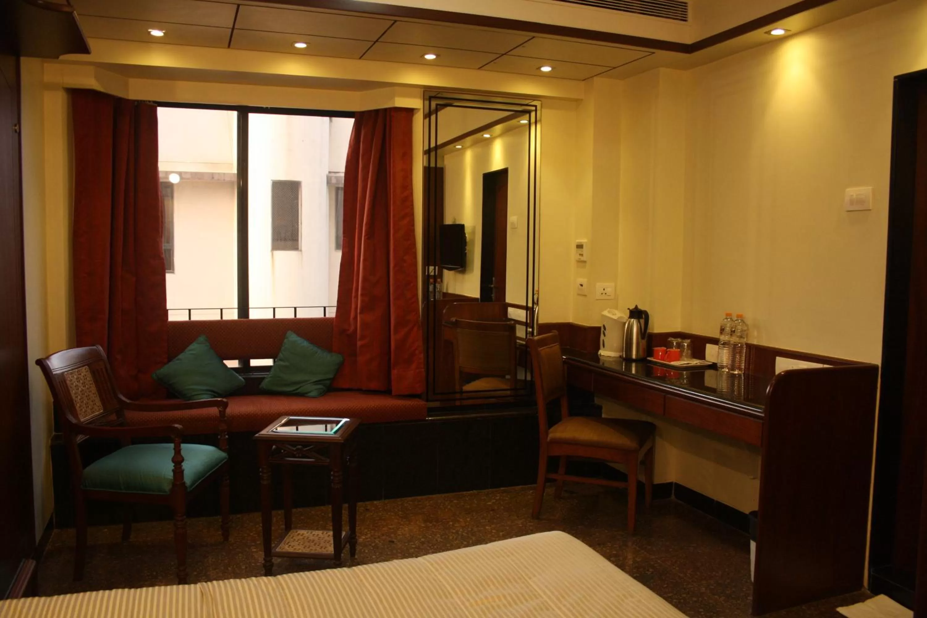 Bed in Hotel Karl Residency