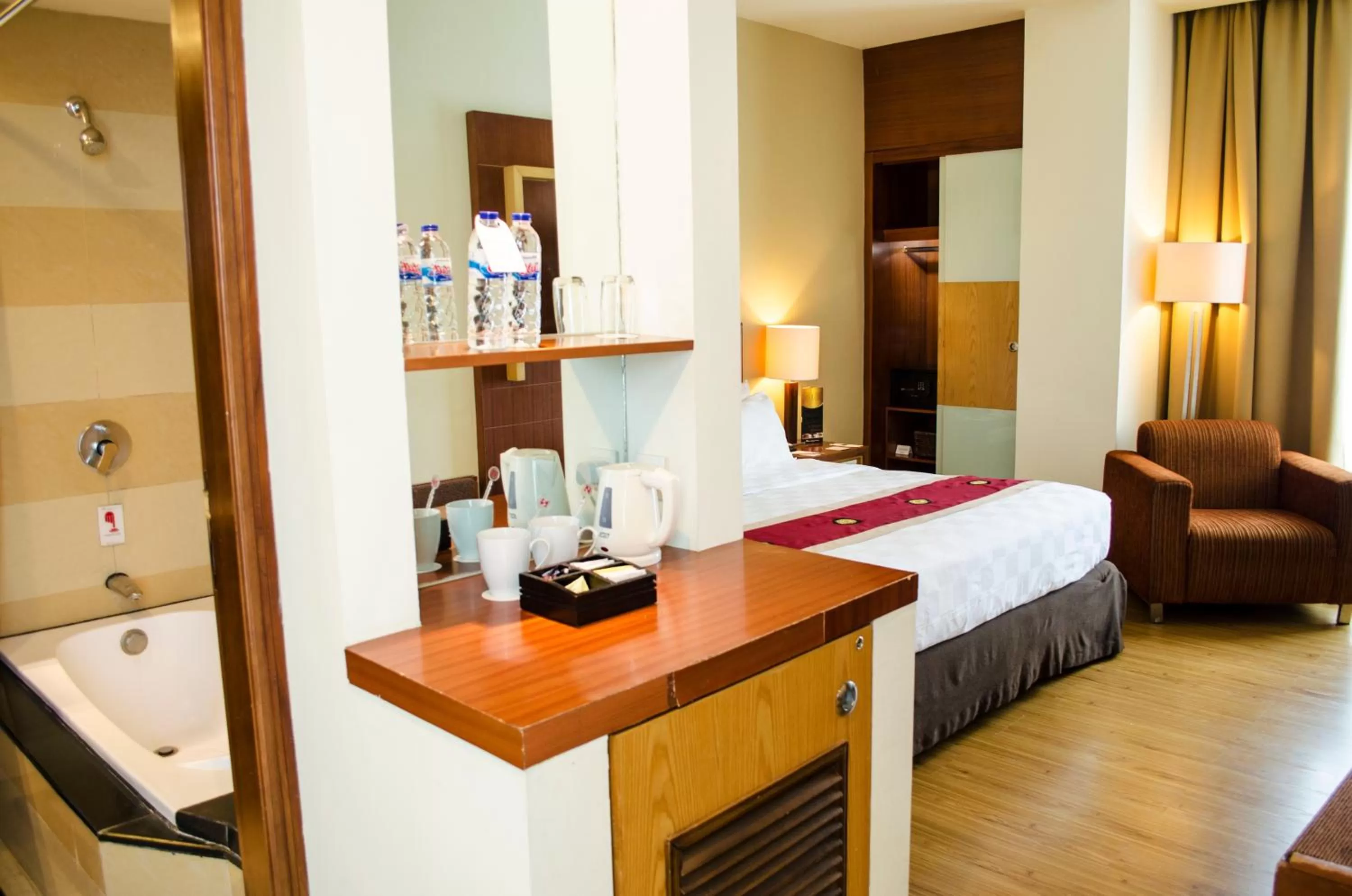 Bed in Swiss-Belhotel Maleosan Manado