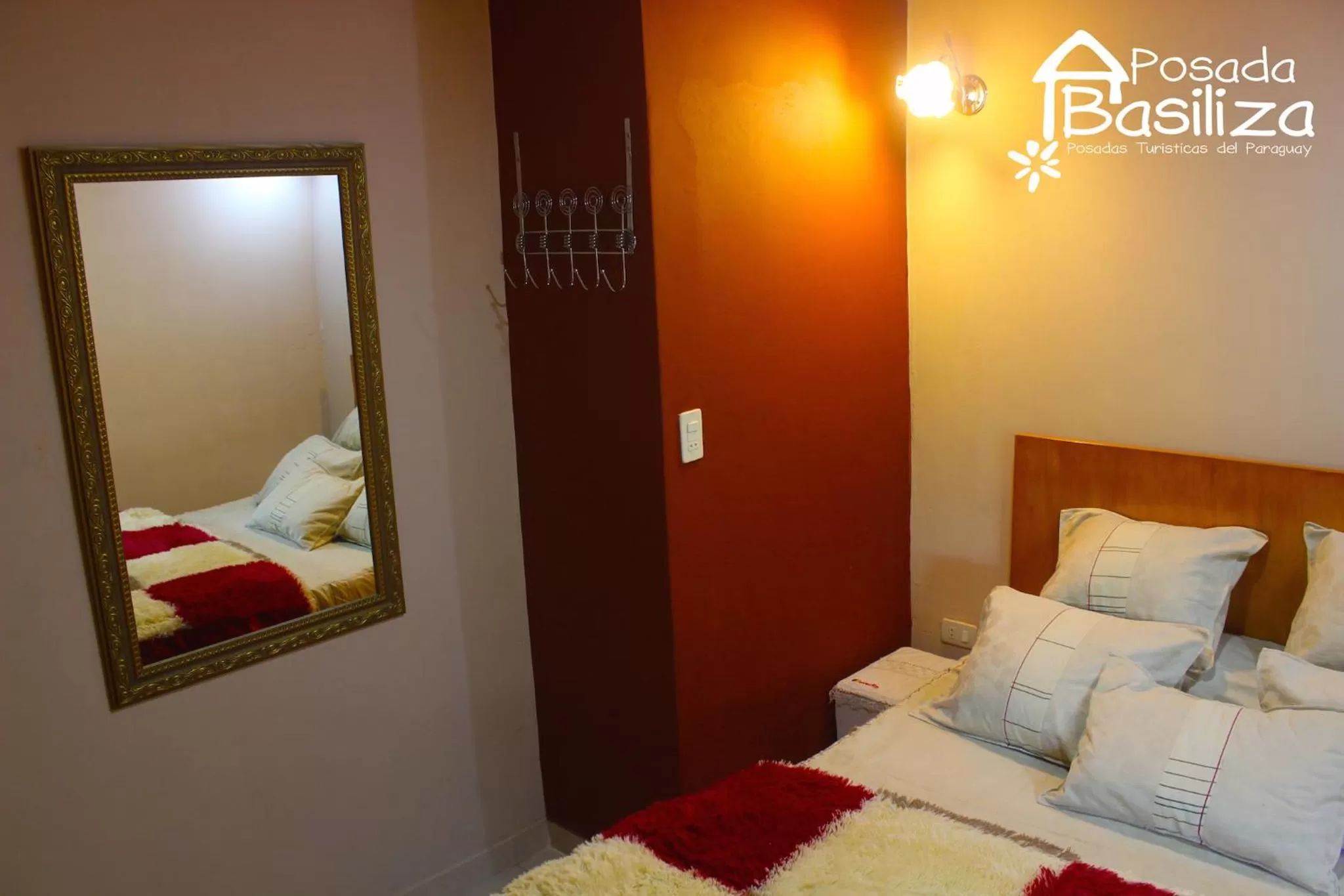 Photo of the whole room, Bed in Posada Basiliza, Encarnación PY