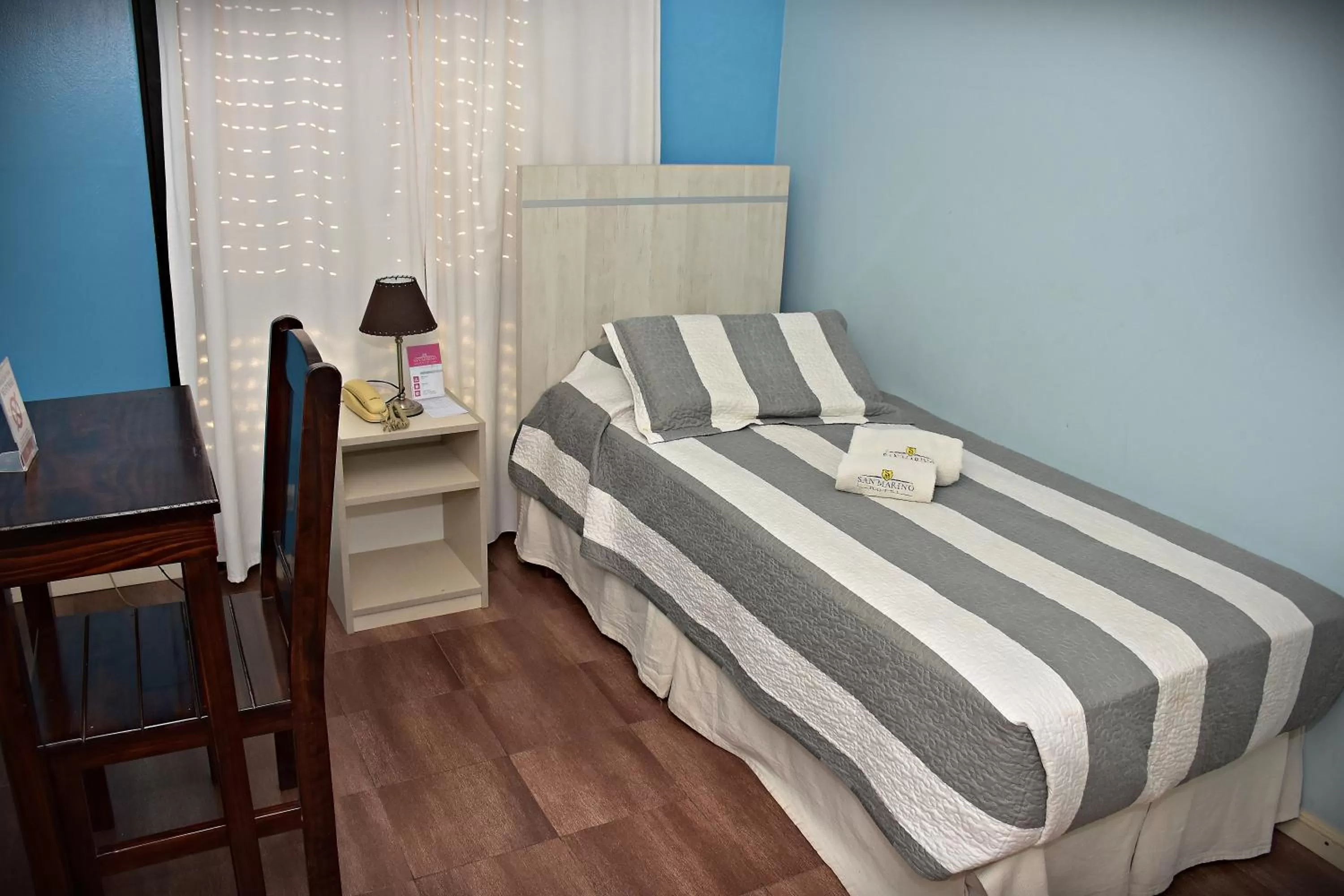 Bed in Hotel San Marino