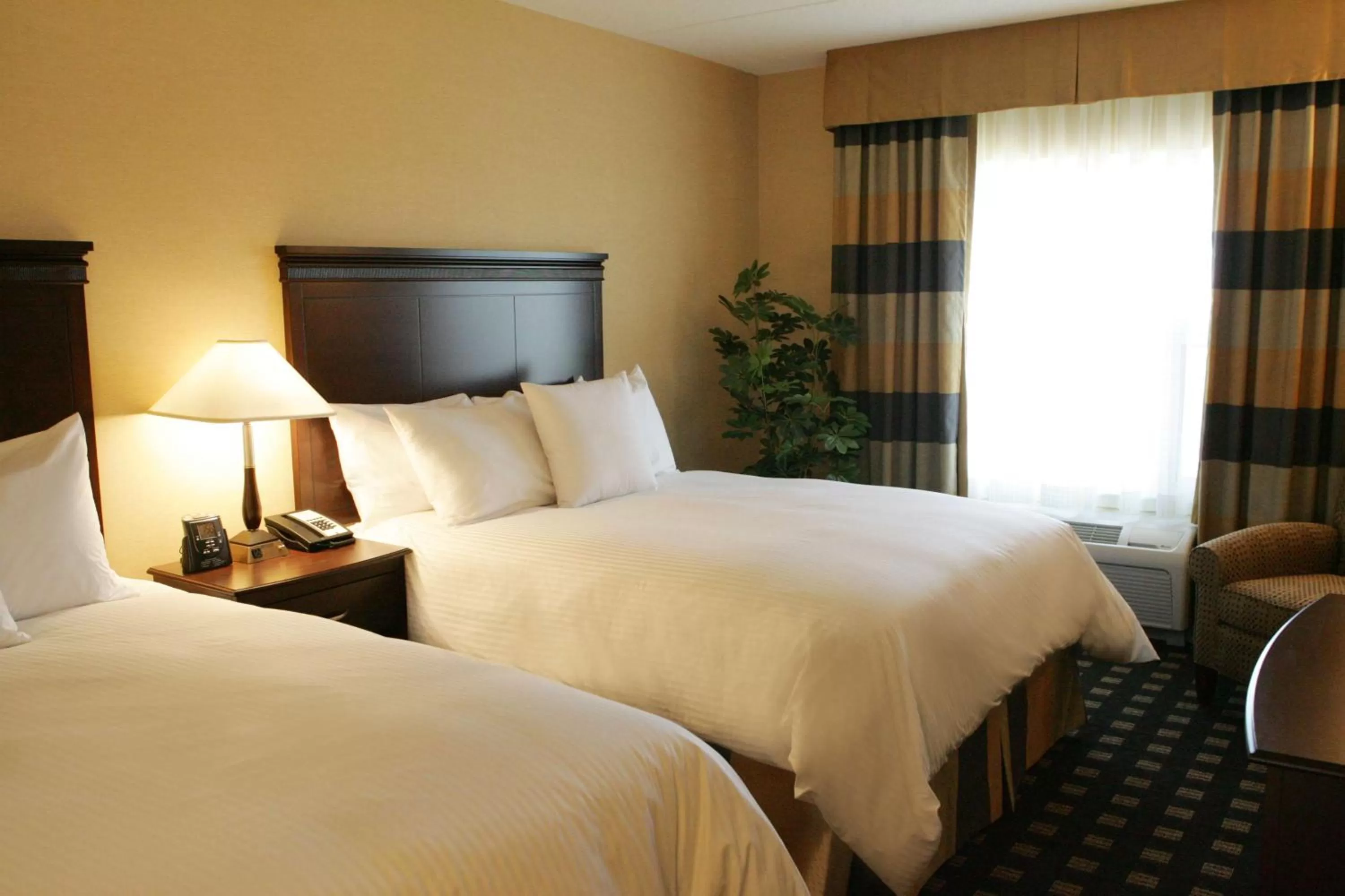 Bed in Homewood Suites by Hilton Toronto Airport Corporate Centre