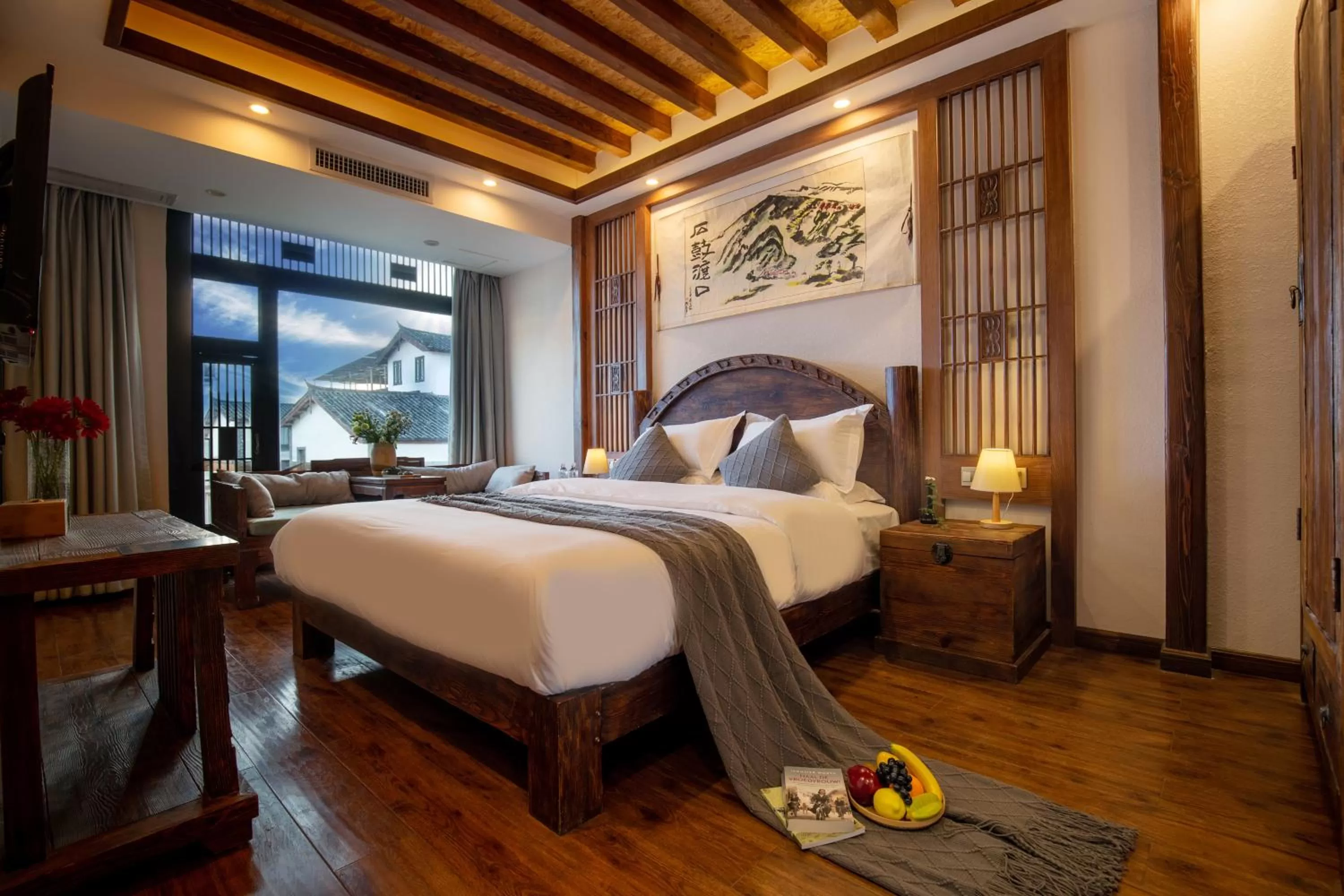 Bed in Lijiang Gemmer Hotel