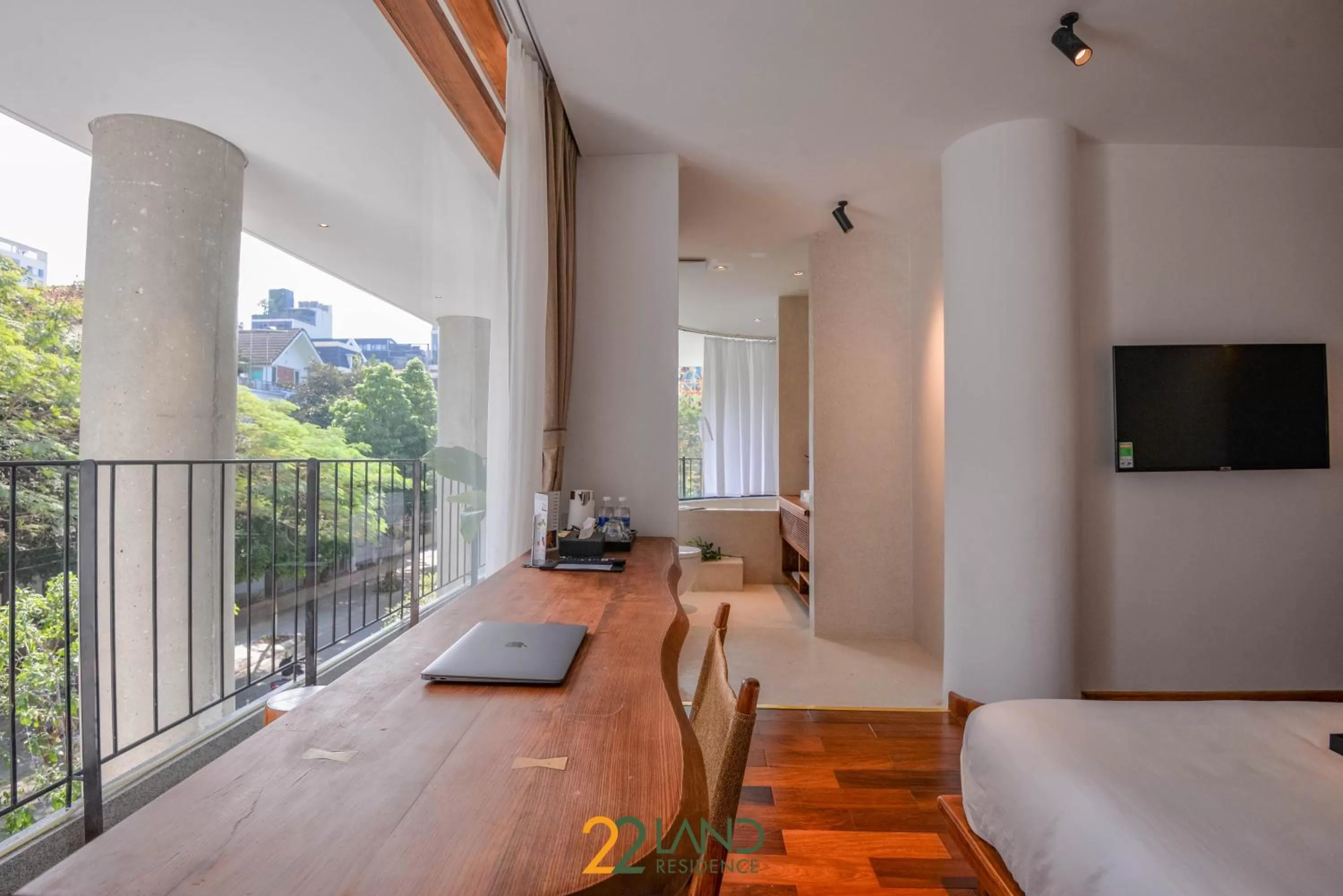 Communal lounge/ TV room, Bed in 22Land Hotel & Residence