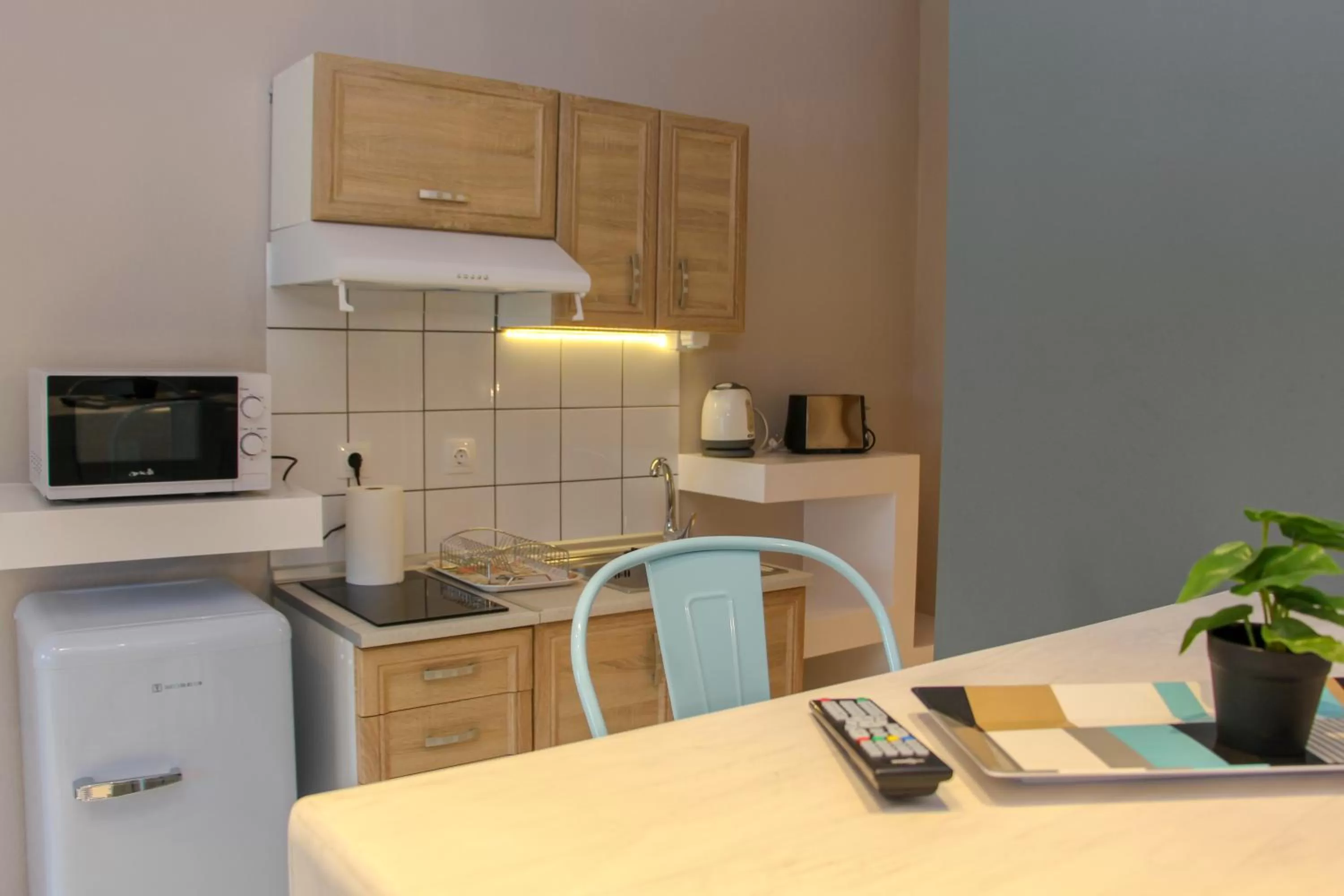 Kitchen or kitchenette in Lamprini's Deluxe Studios