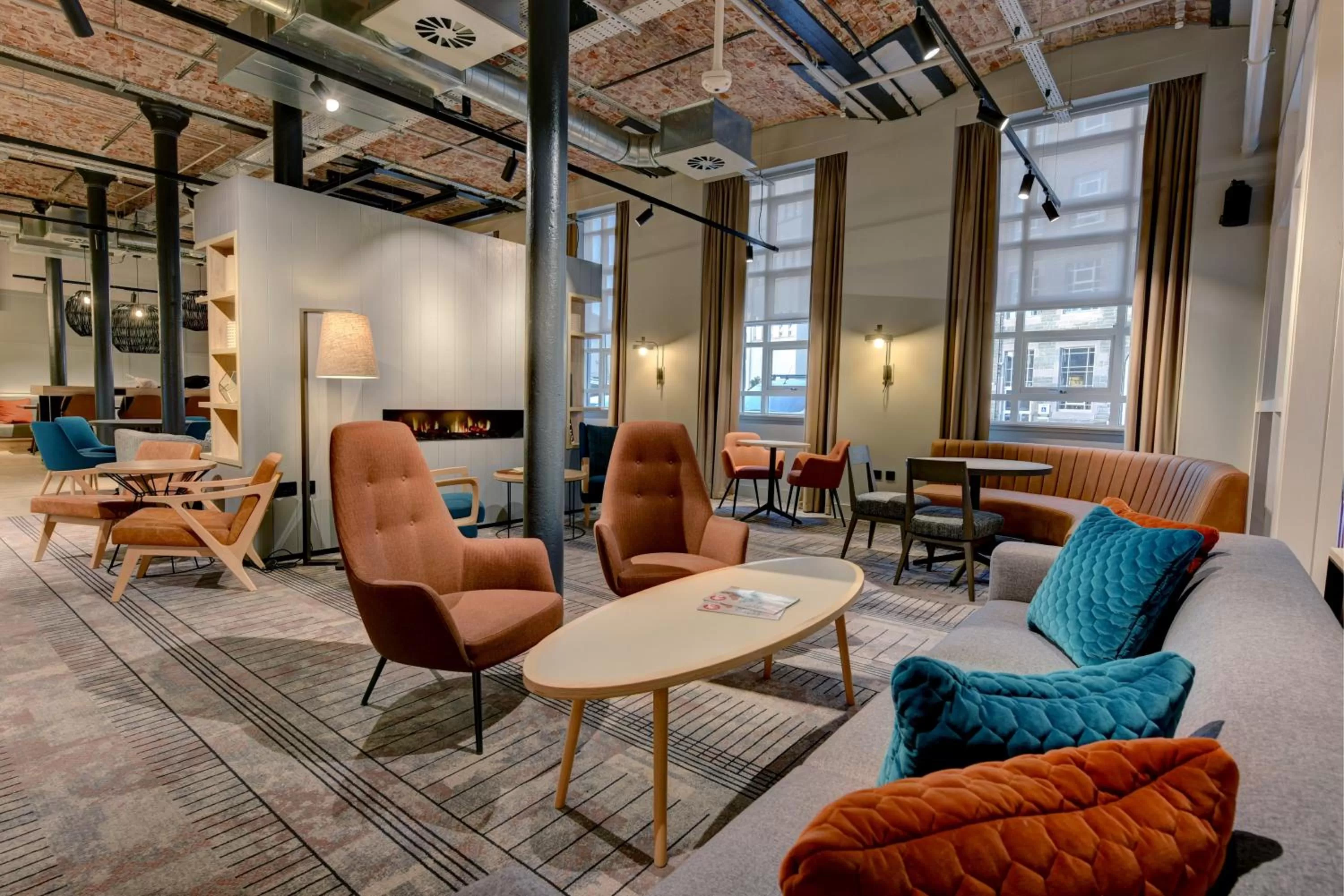 Communal lounge/ TV room in Staybridge Suites - Dundee by IHG