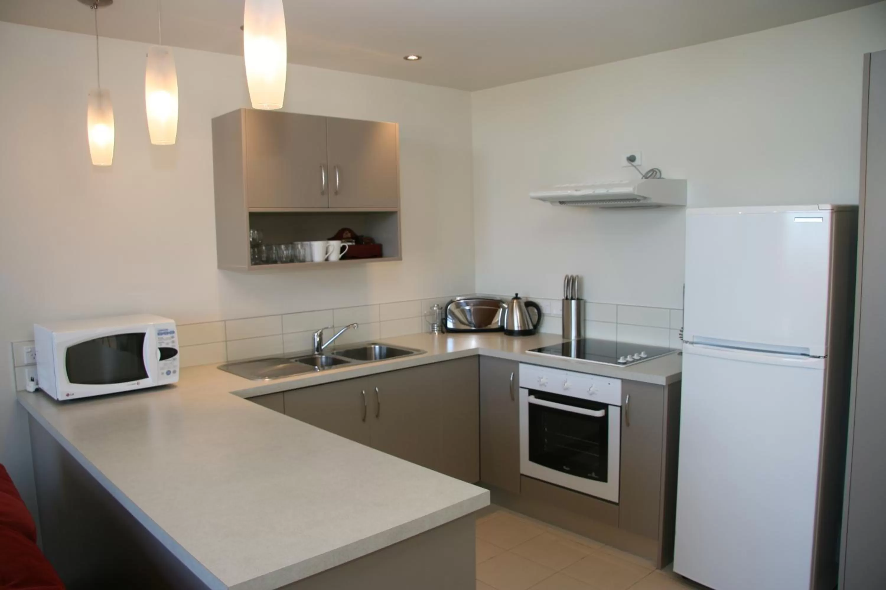 Kitchen or kitchenette in Oceans Resort Whitianga