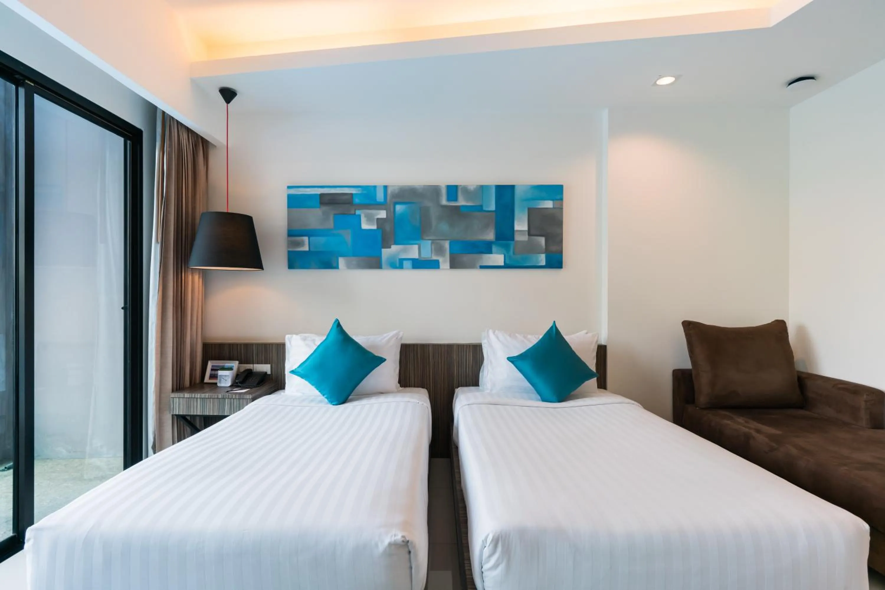 Bed in Hotel J Residence Pattaya