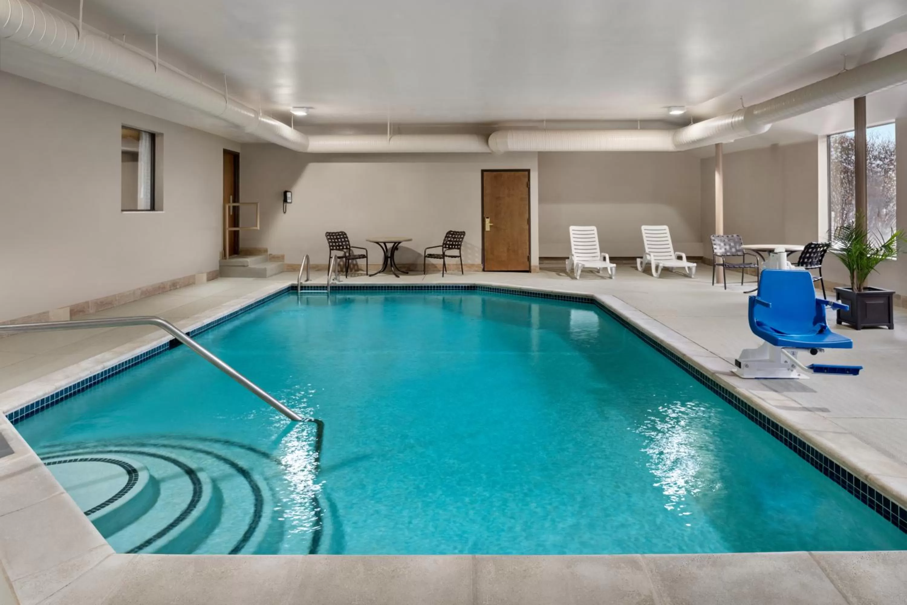 Swimming pool in Baymont by Wyndham Belleville Airport Area Free Airport Shuttle