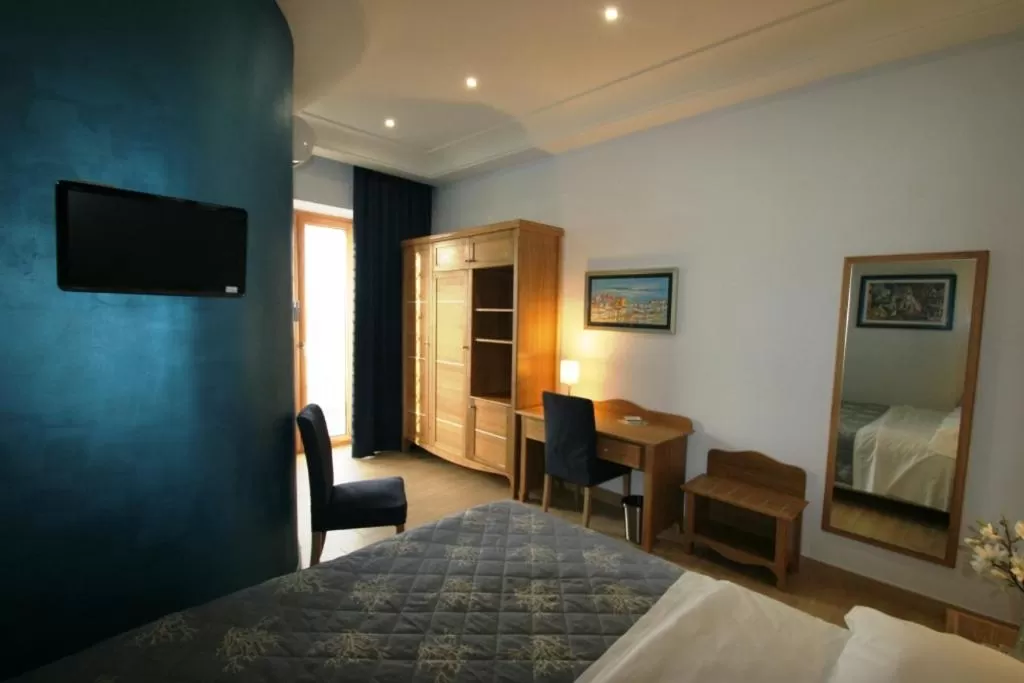 Seating area, Bed in b&b Dea Fortuna