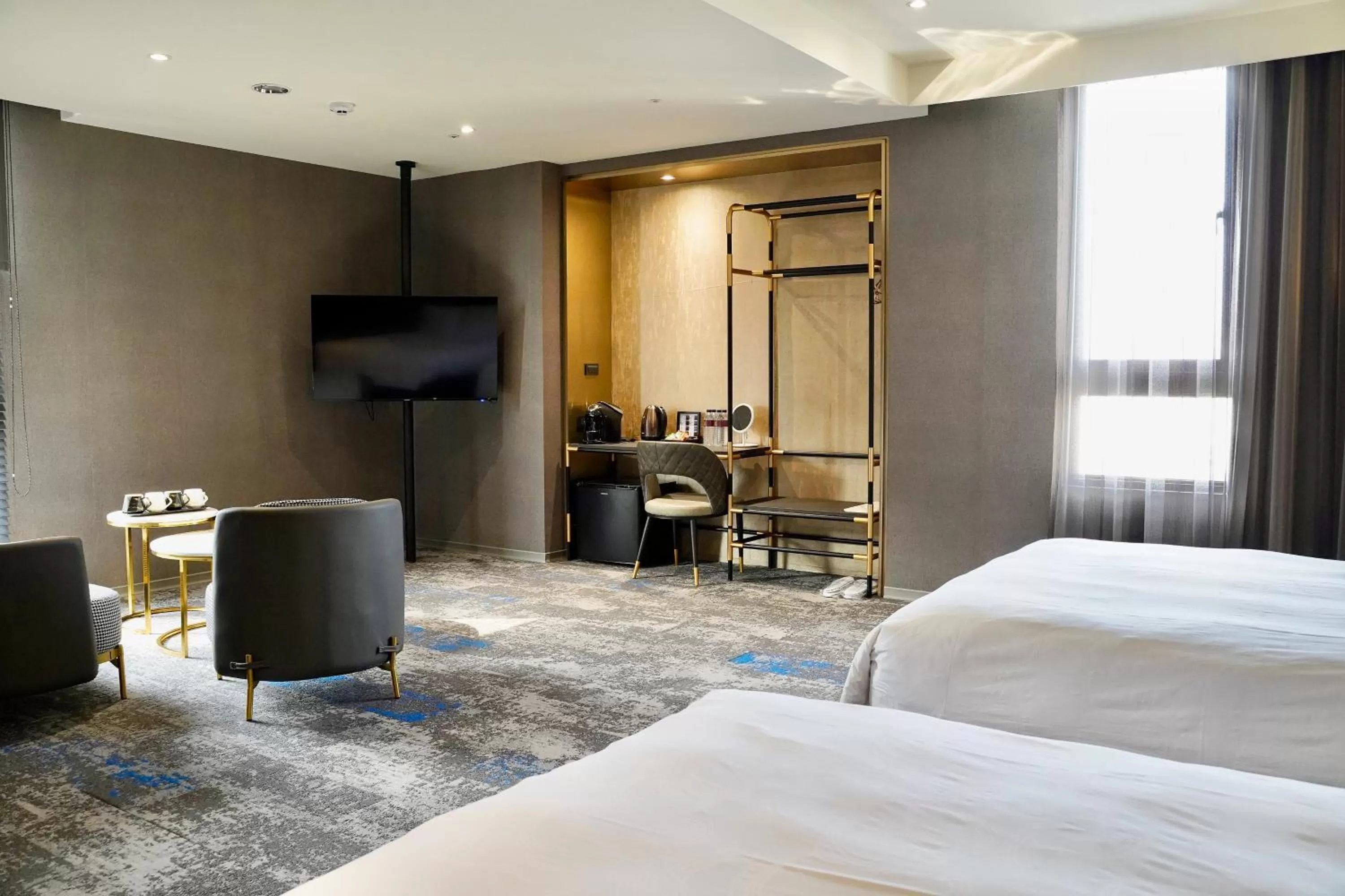 Bed in Tenz Go Hotel