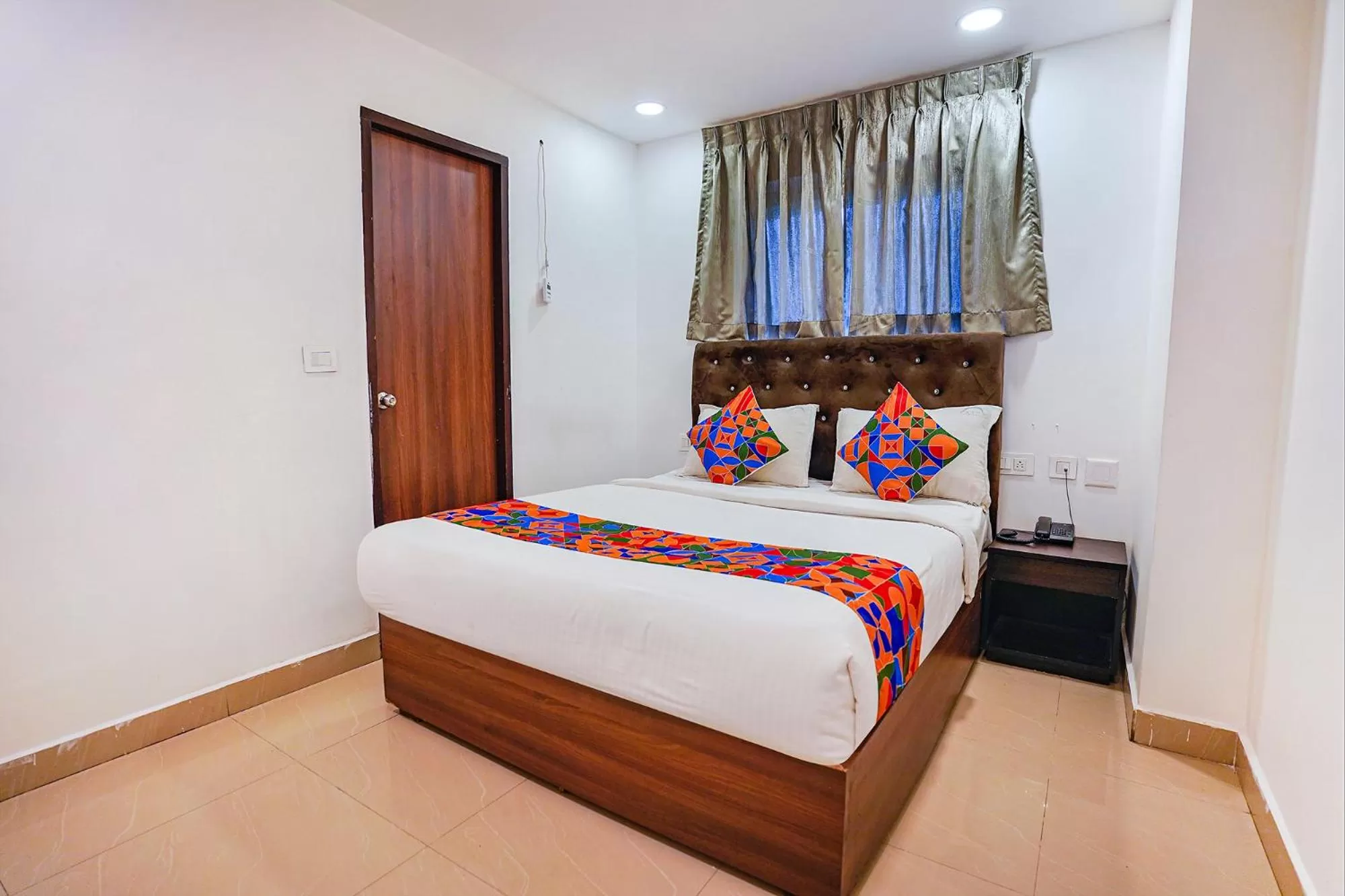 Bed in FabHotel Earth