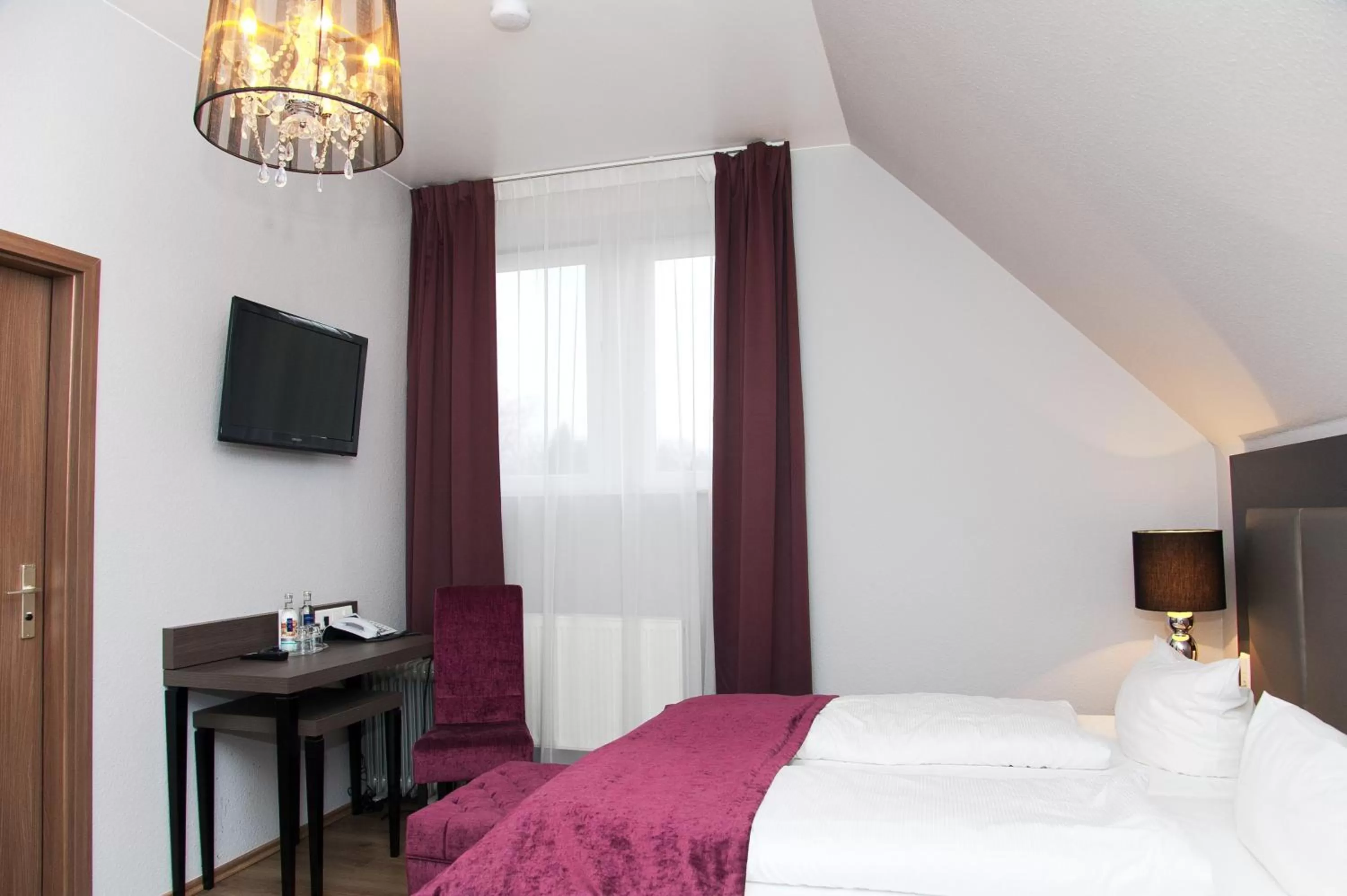 Photo of the whole room, Bed in Arena Villa am Wasserpark