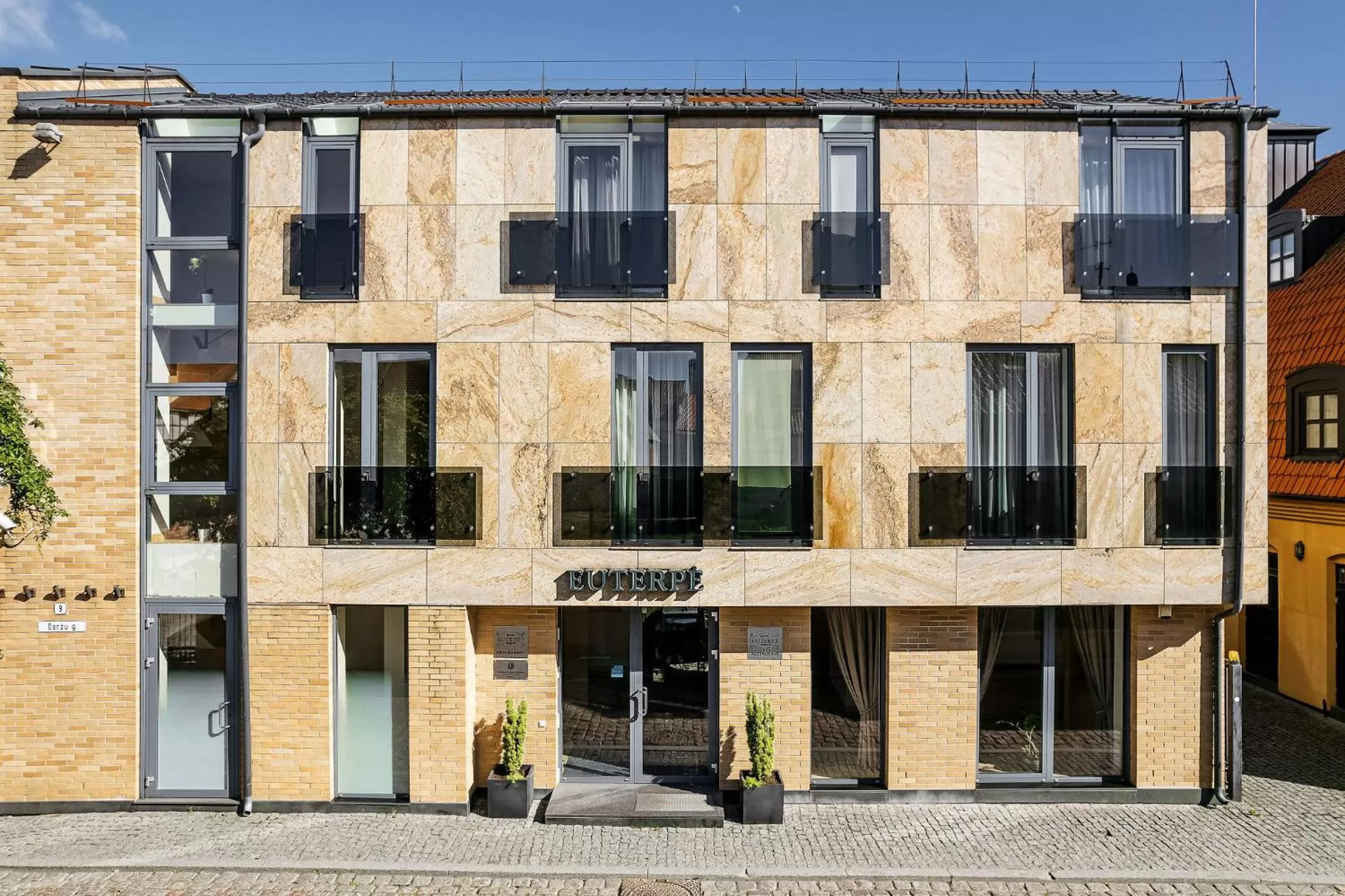 Facade/entrance in Euterpe Hotel