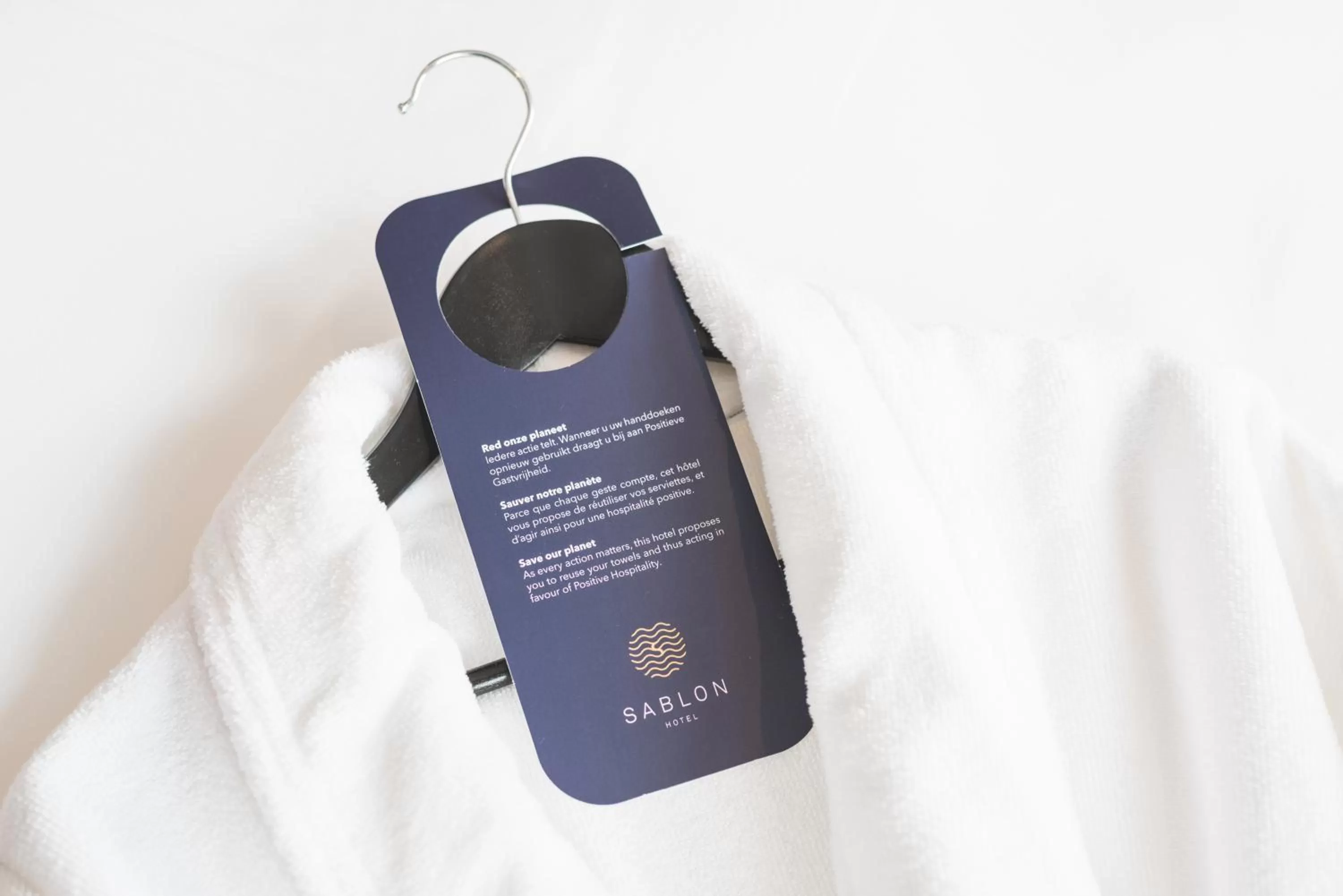 Property logo or sign in Boutique Hotel Sablon by CW Hotel Collection