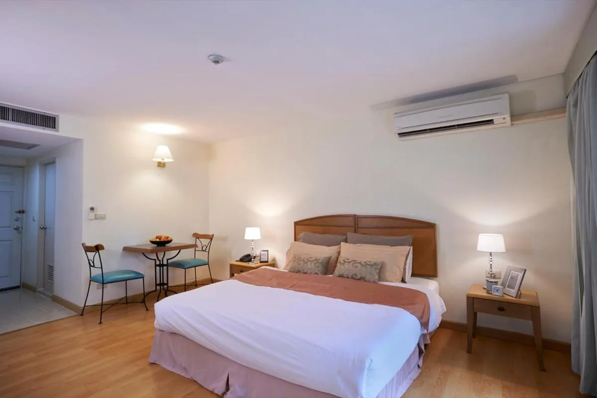 Photo of the whole room, Bed in Ravipha Residences