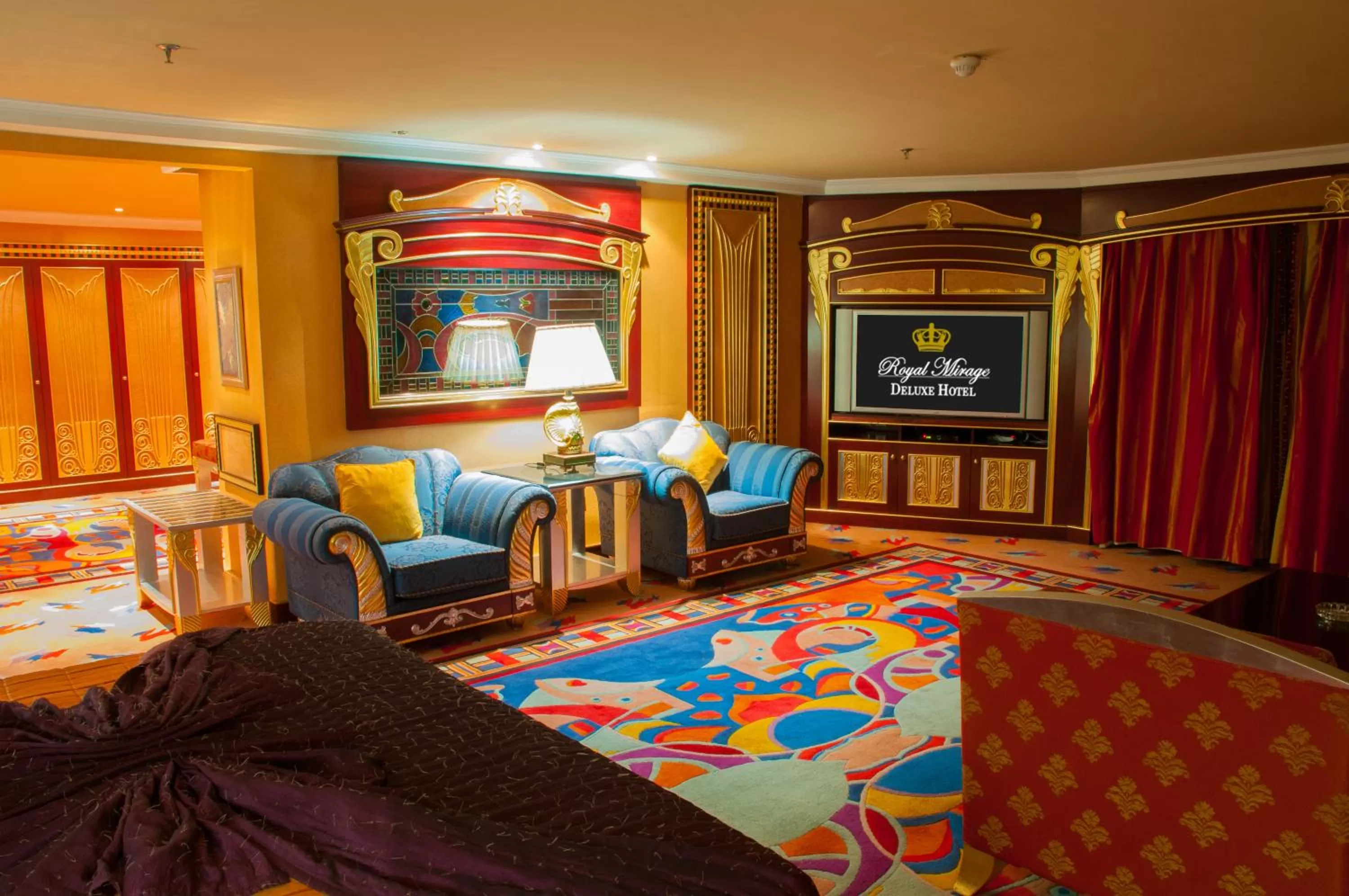 Communal lounge/ TV room, Bed in Royal Mirage Deluxe