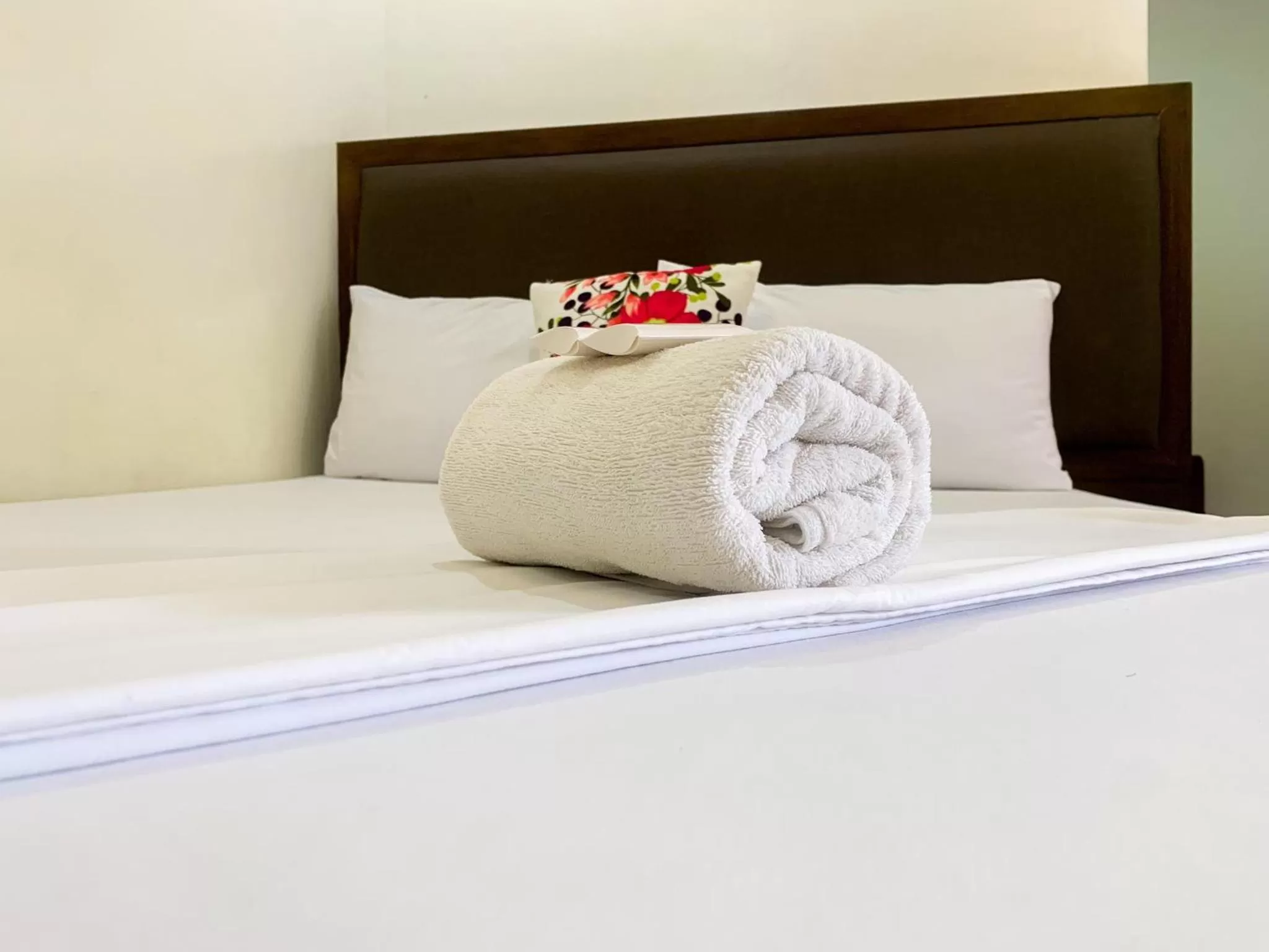 Bed in Jurias Garden Hotel