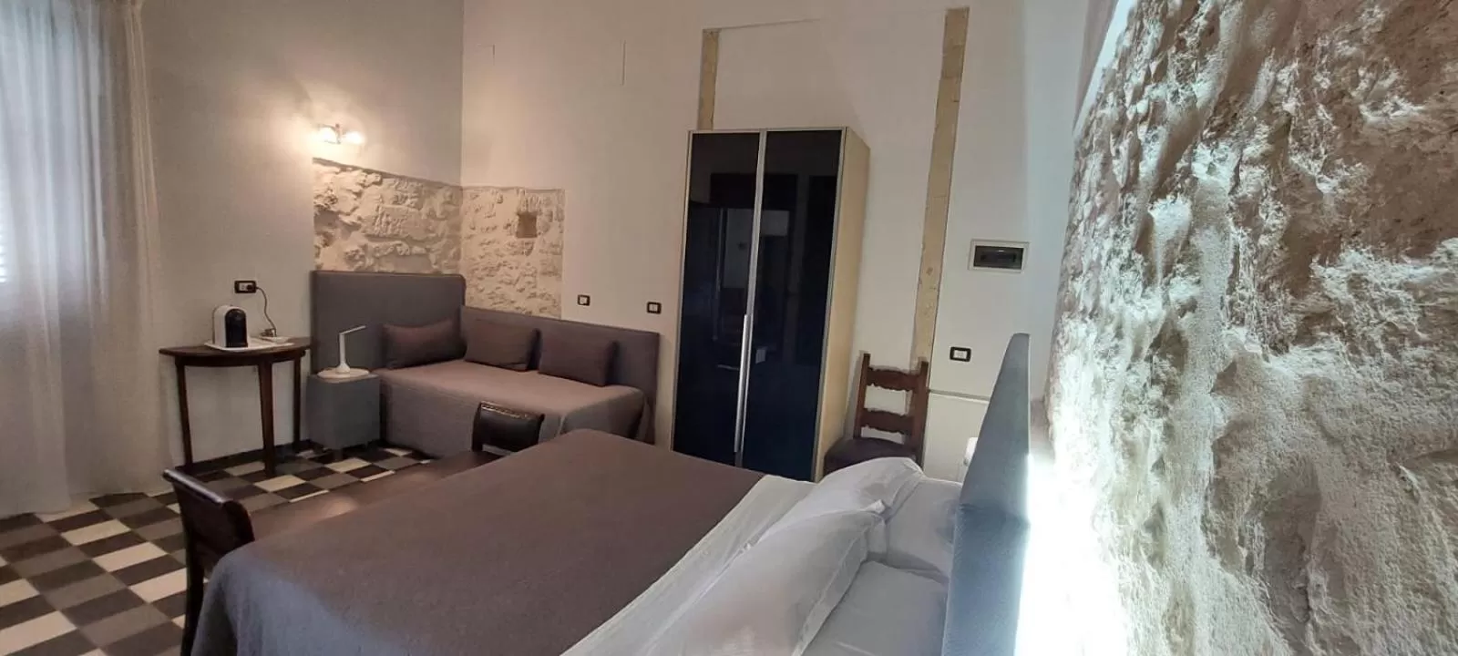 Bed in Lakkios charming suites and rooms