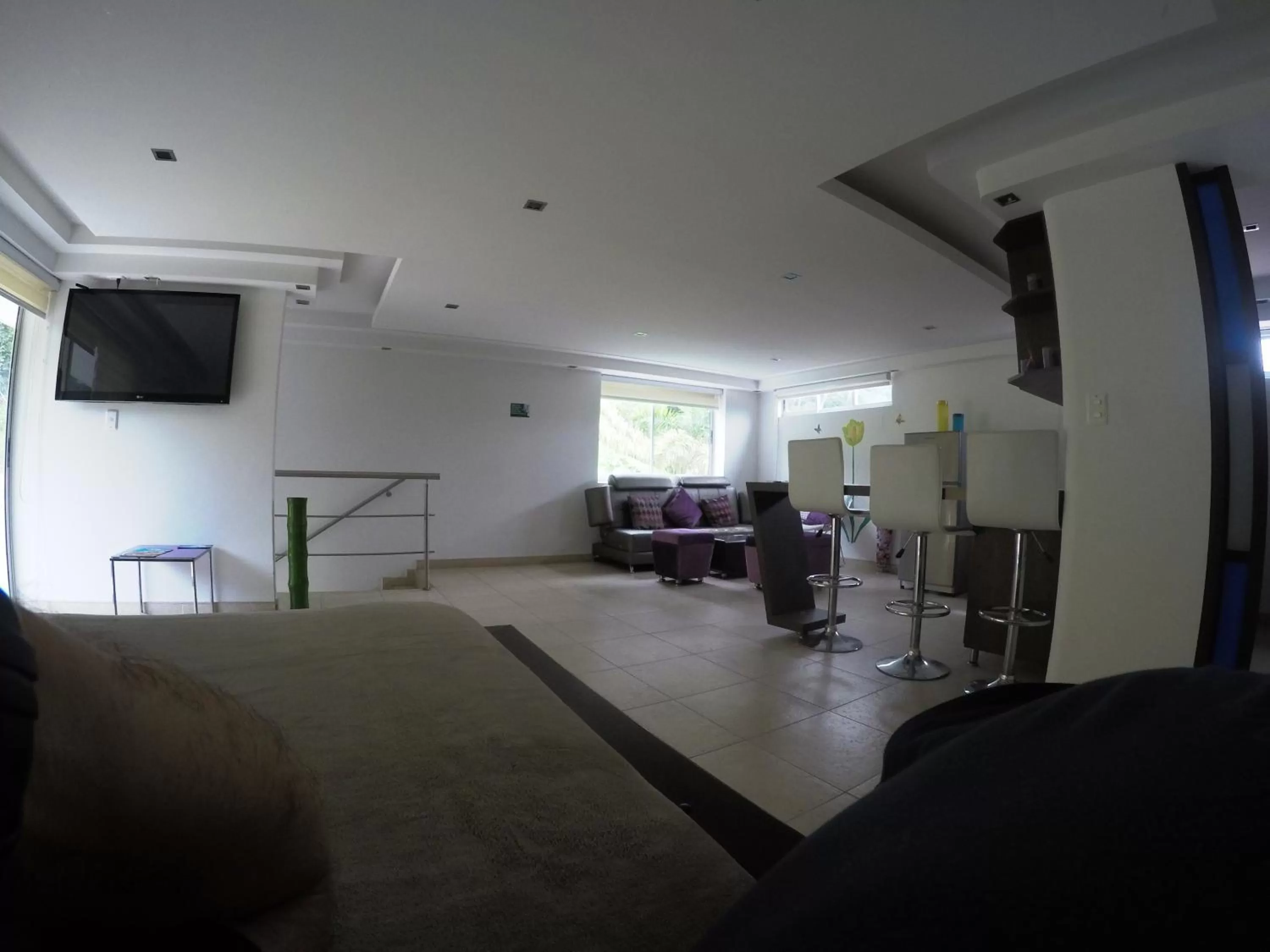 Communal lounge/ TV room in Sky Club Eco Hotel