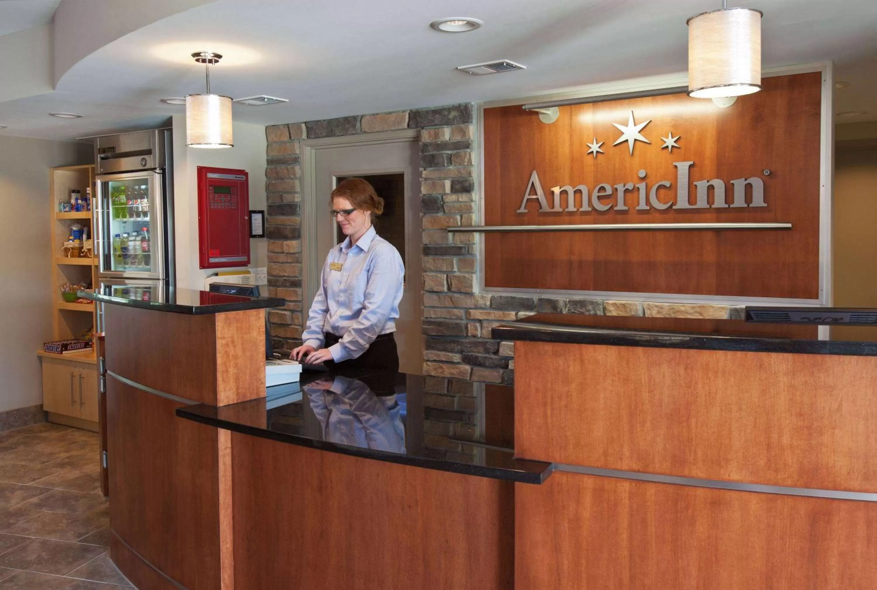 Lobby or reception in AmericInn by Wyndham Fairfield