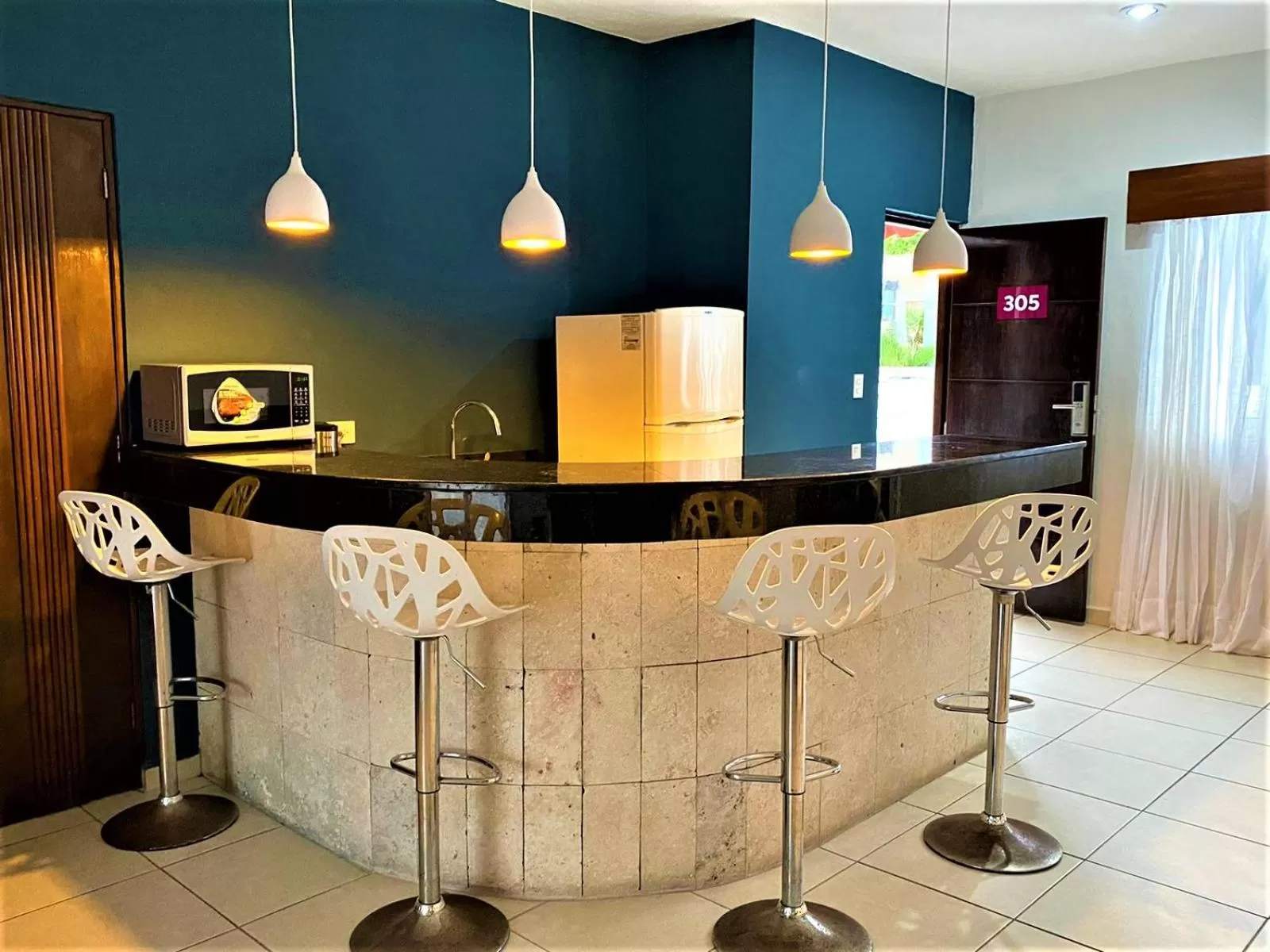 kitchen in Hotel Mariachi by Kavia 5th Av