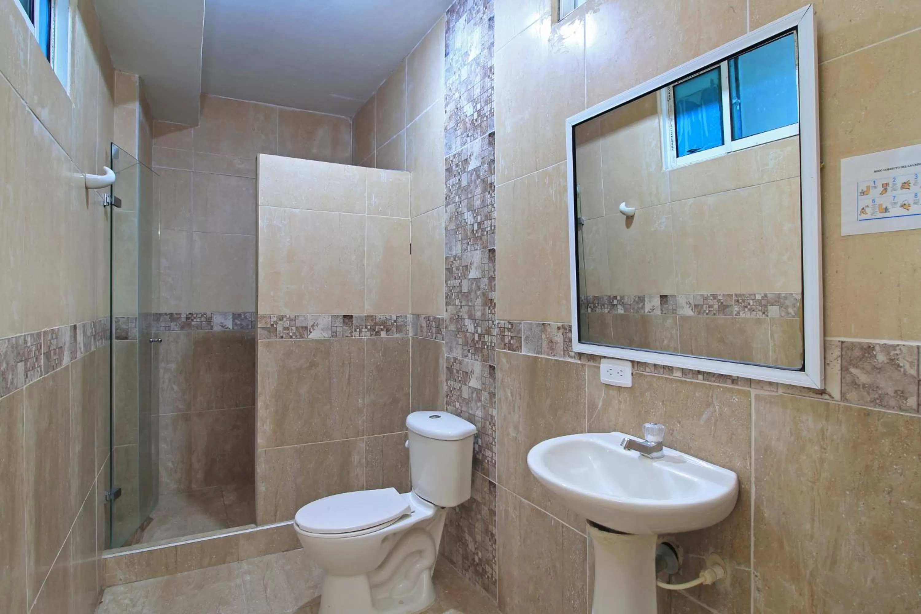 Shower in Hotel Abi Inn By GEH Suites