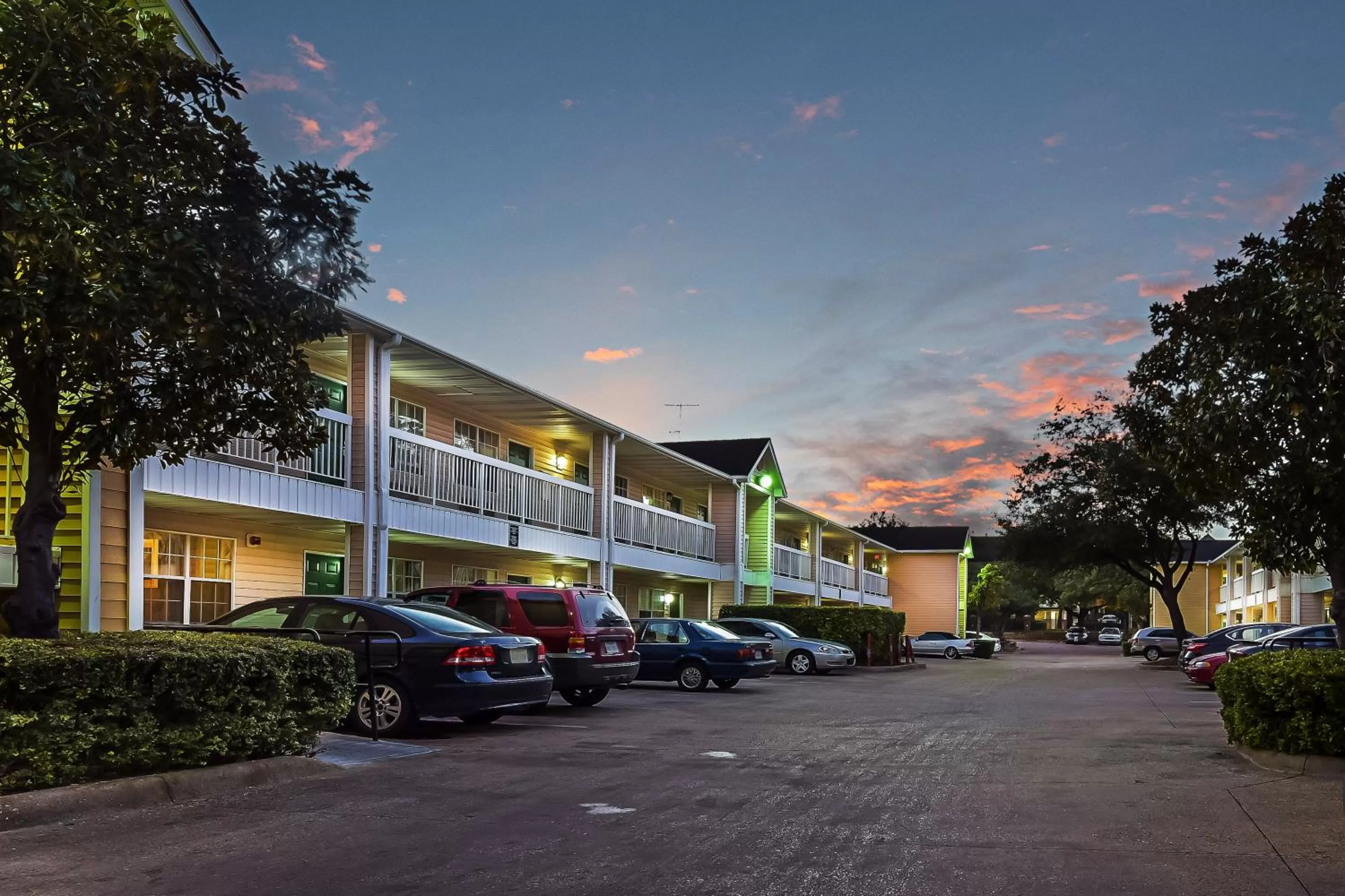 Property building in HomeTowne Studios by Red Roof Dallas - North Addison - Tollway