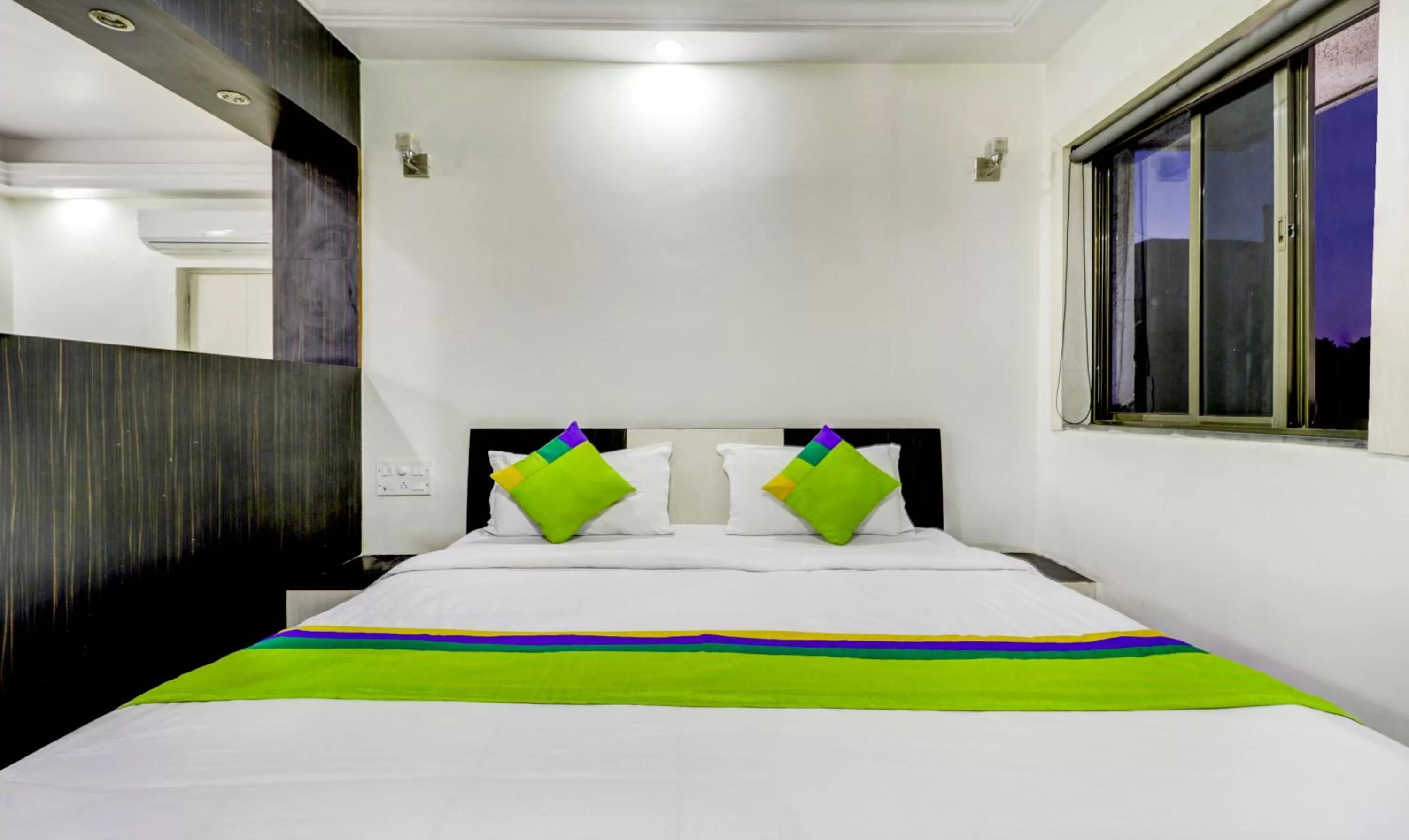 Bed in Treebo Trend Orange City