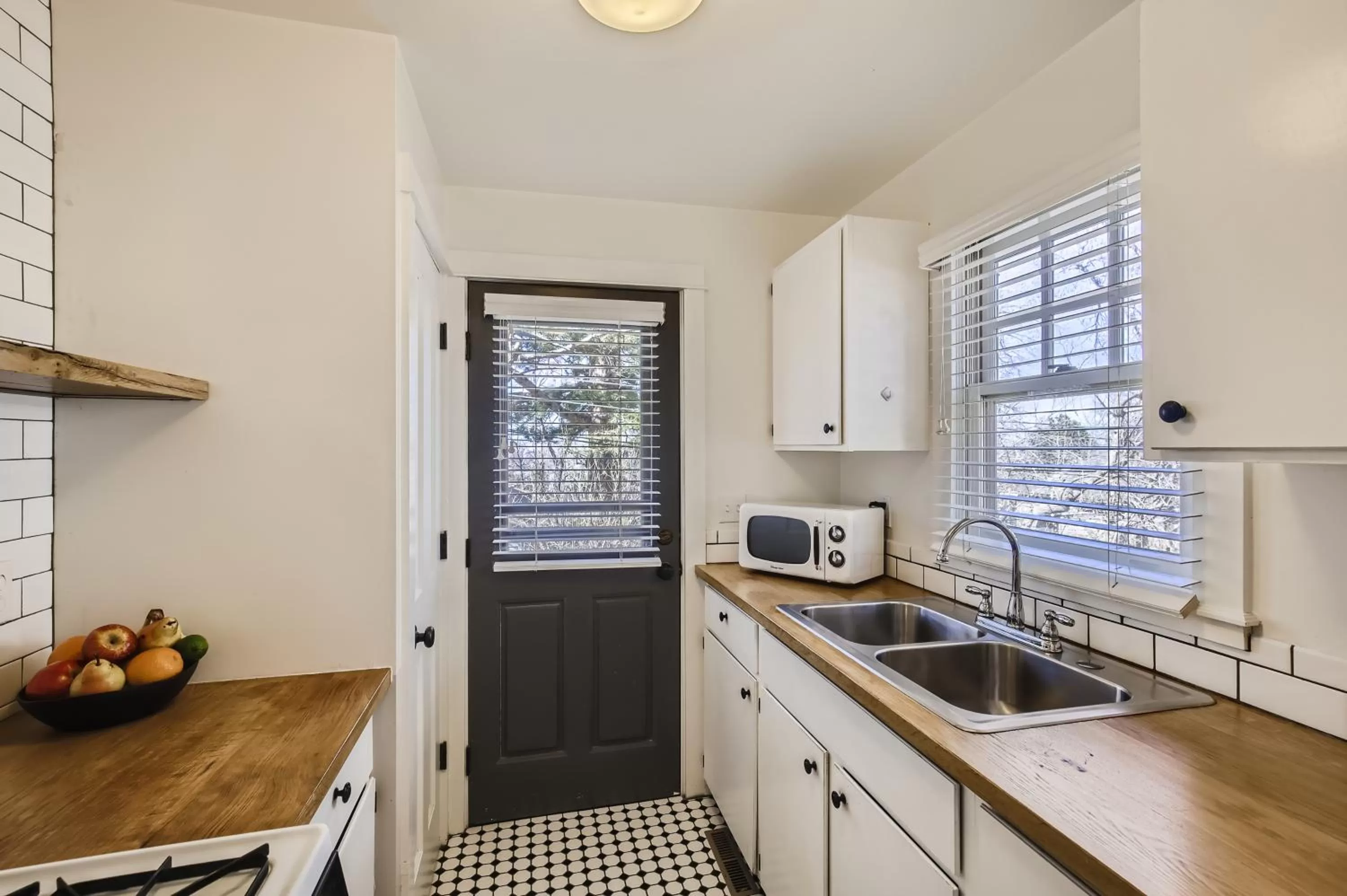 Kitchen or kitchenette in Colorado Chautauqua Cottages