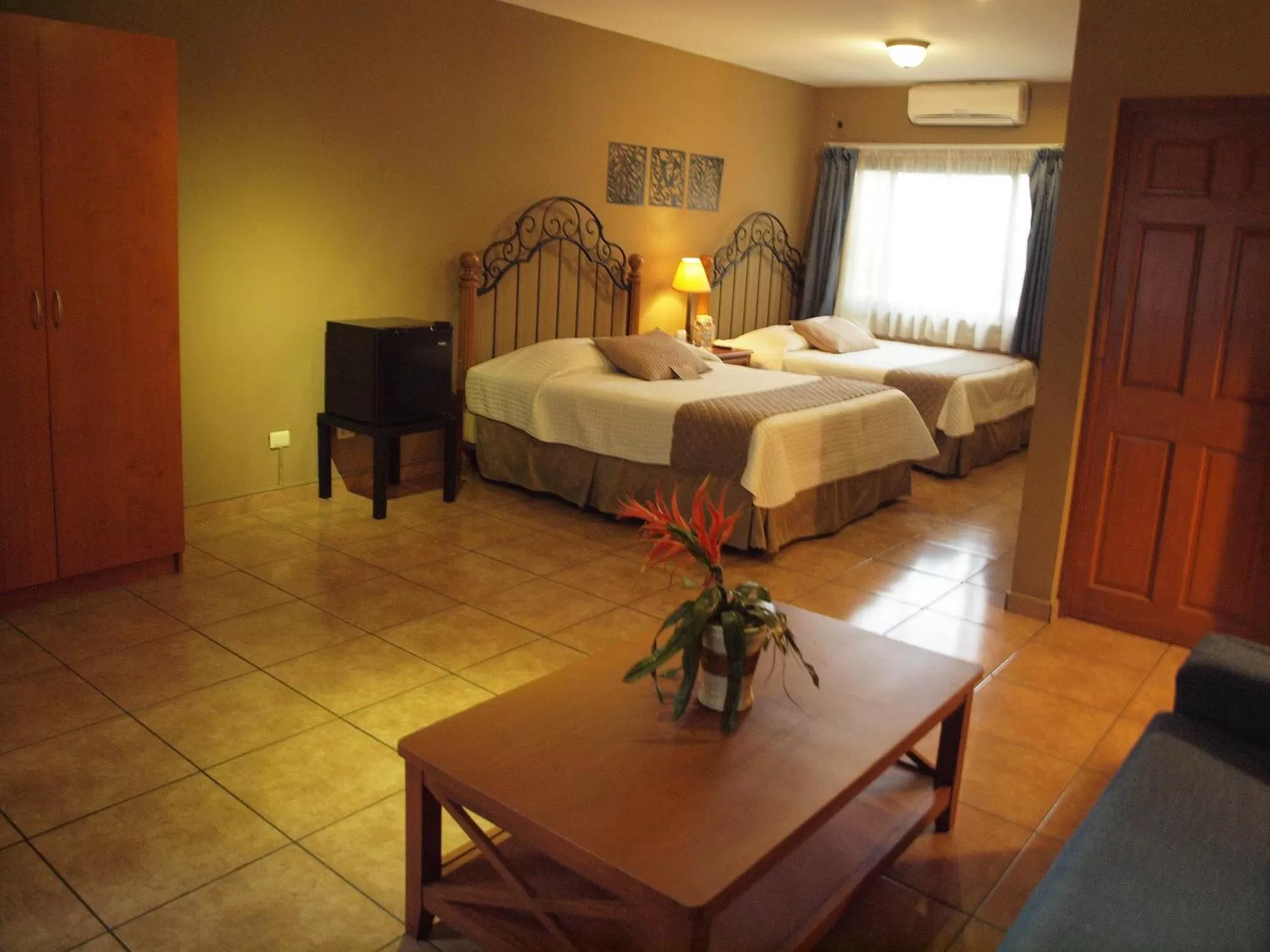 Seating area, Bed in Las Magnolias Hotel Boutique