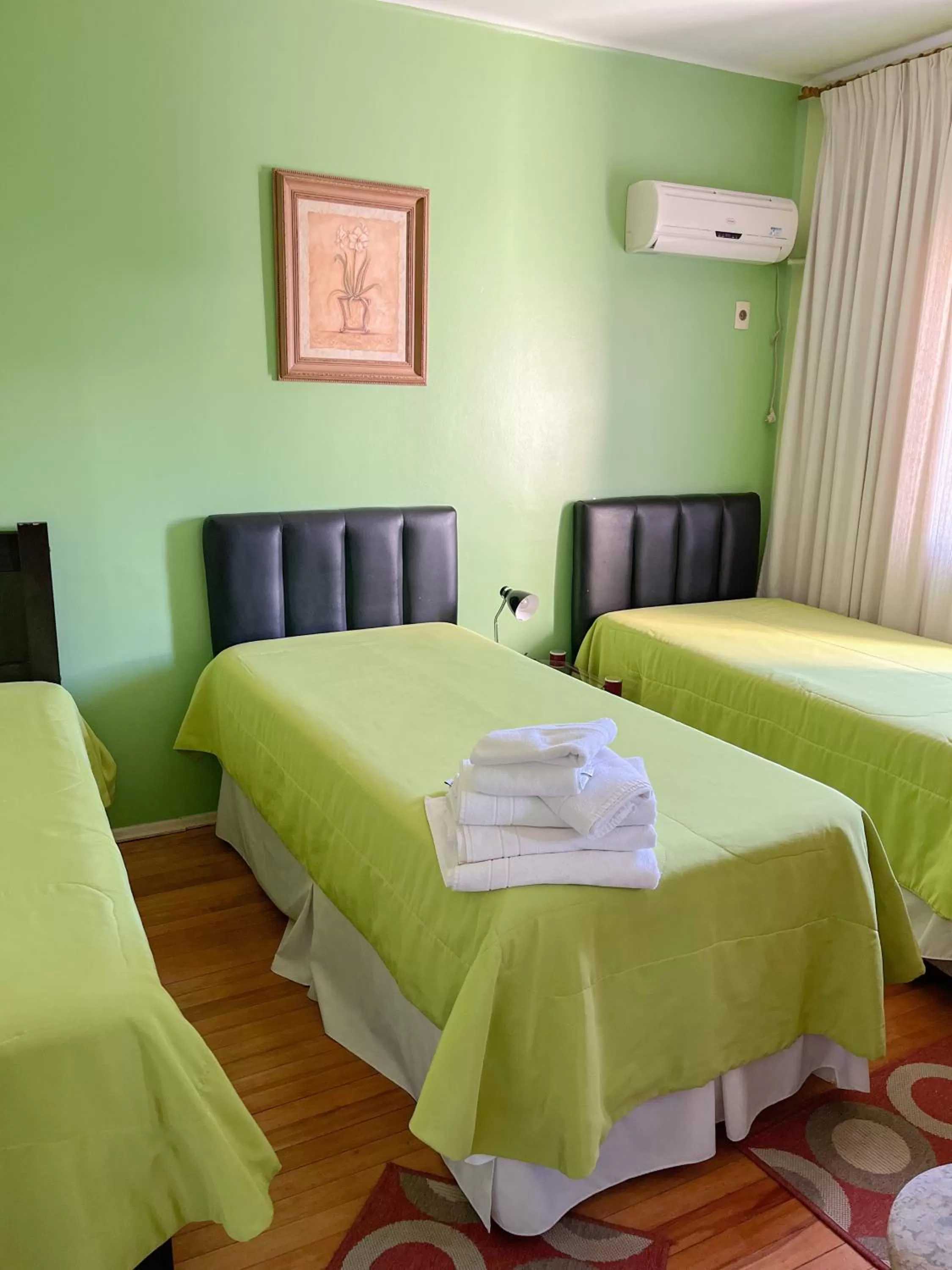 Bed in Hotel Uruguay Brasil