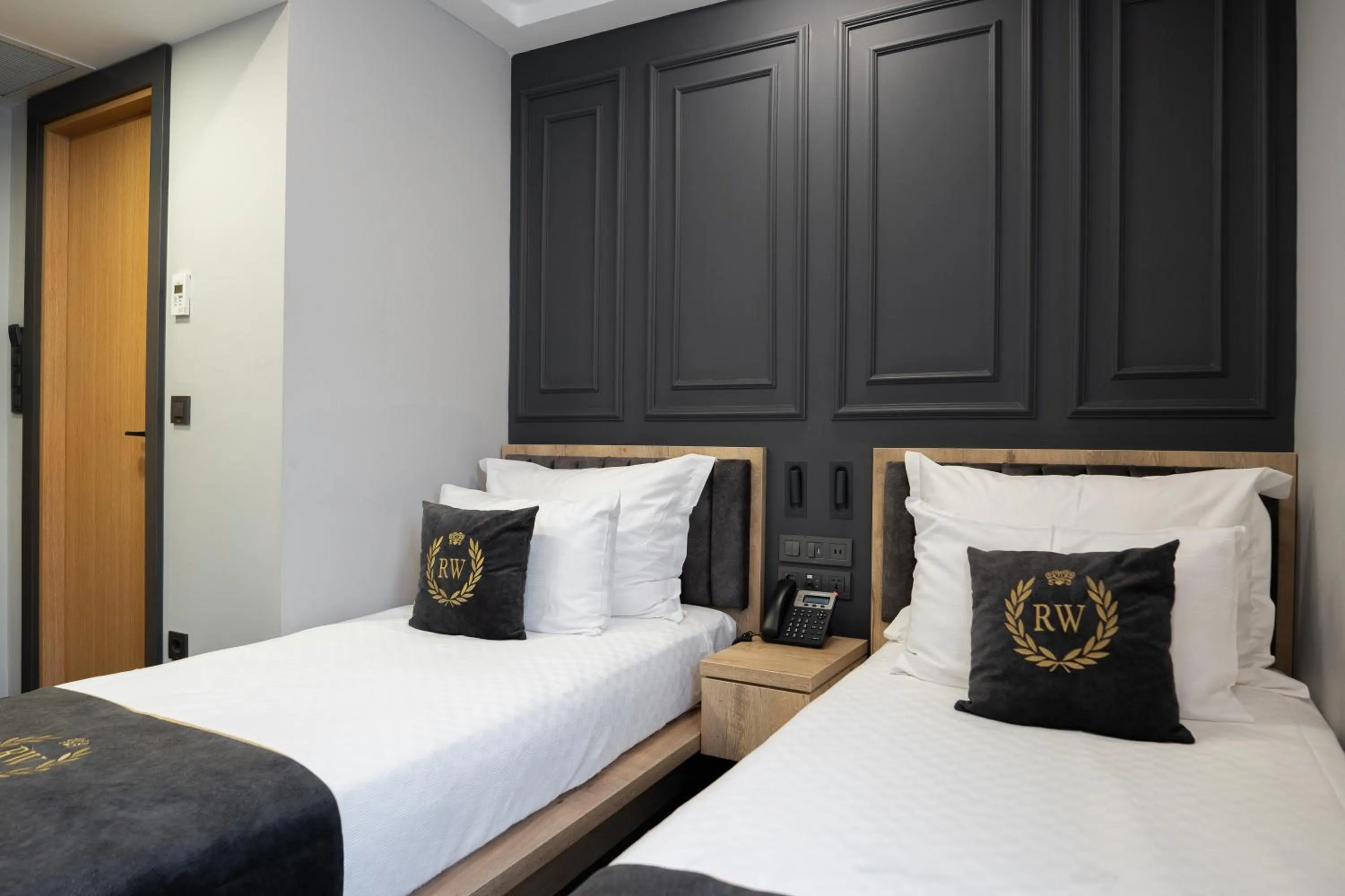 Bed in RW BOUTIQUE HOTEL