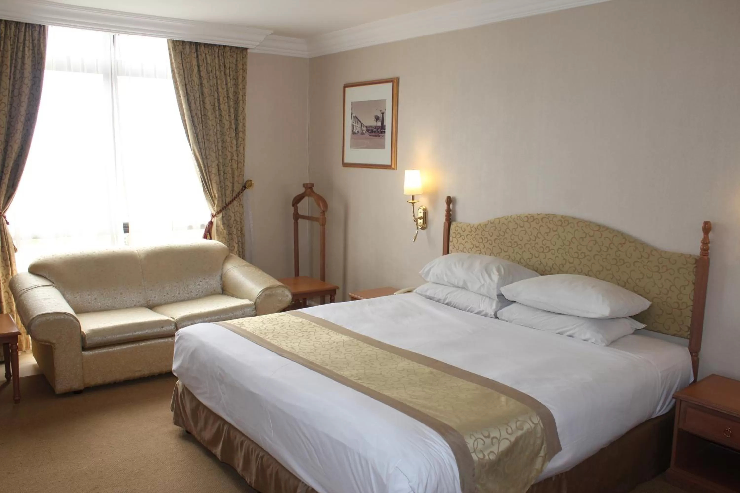 Bed in Merdeka Palace Hotel & Suites