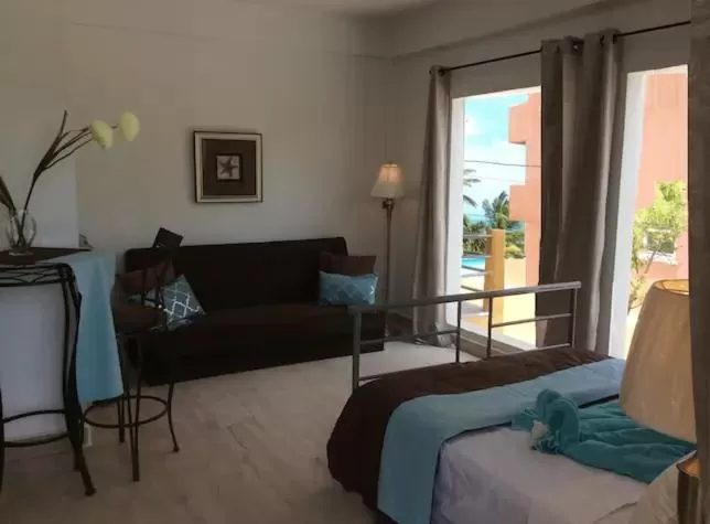 Seating Area in Beach Side Condos Caye Caulker by CCVH