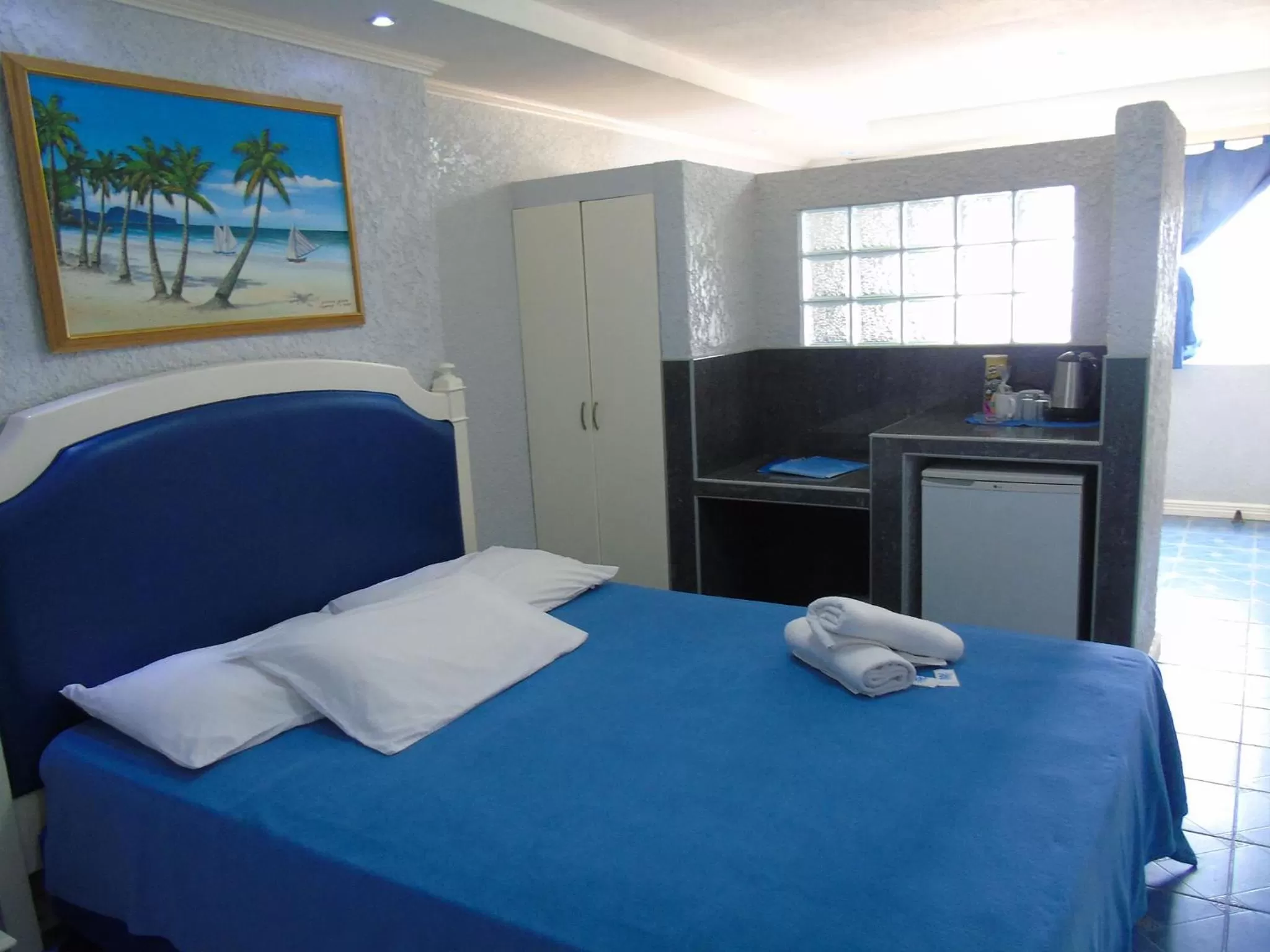 Photo of the whole room, Bed in Blue Rock Resort