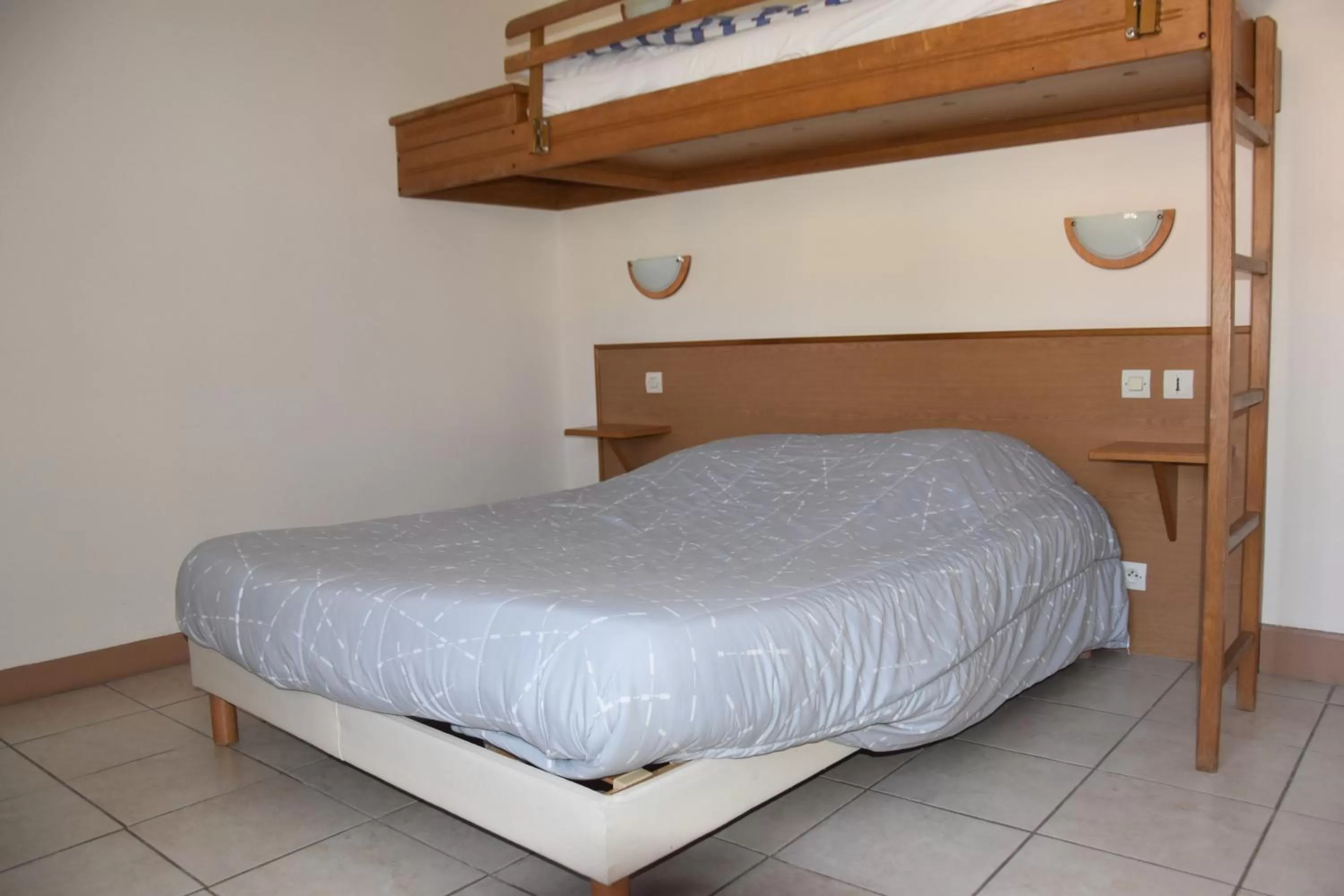 Bed in Hotel Gai Relais