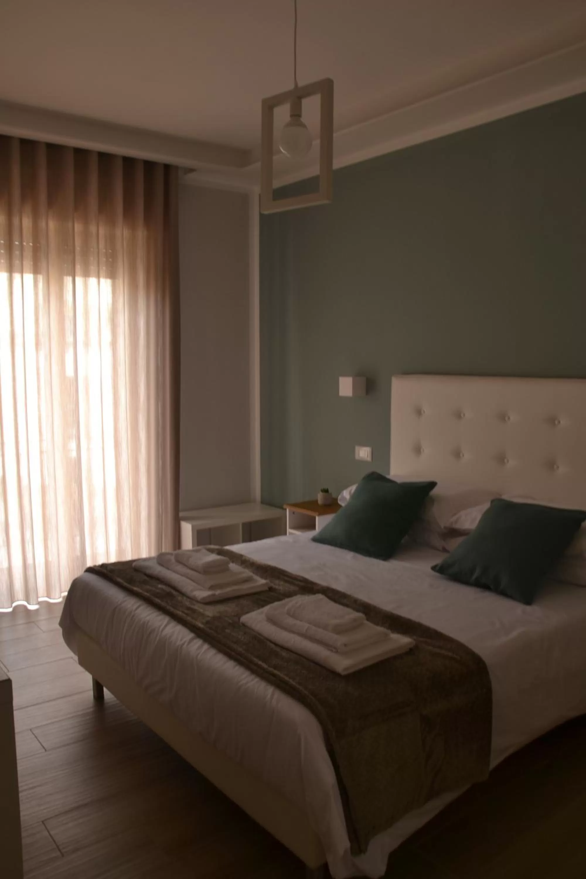 Bed in Luna Nuova Suites