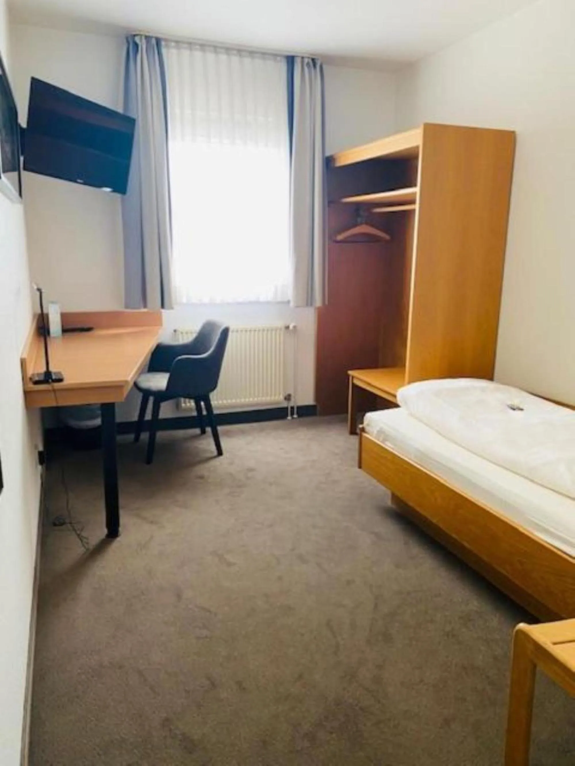 Staff, Bed in Hotel Christina